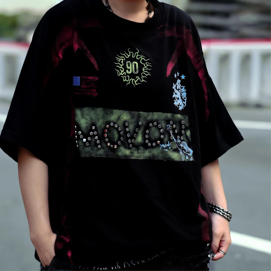 Sanhoostudio short sleeve T-shirt featuring flame-inspired graphics, studded detailing, heavyweight fabric, and a relaxed oversized fit. Designed for vintage streetwear styling with breathable comfort and bold everyday appeal.