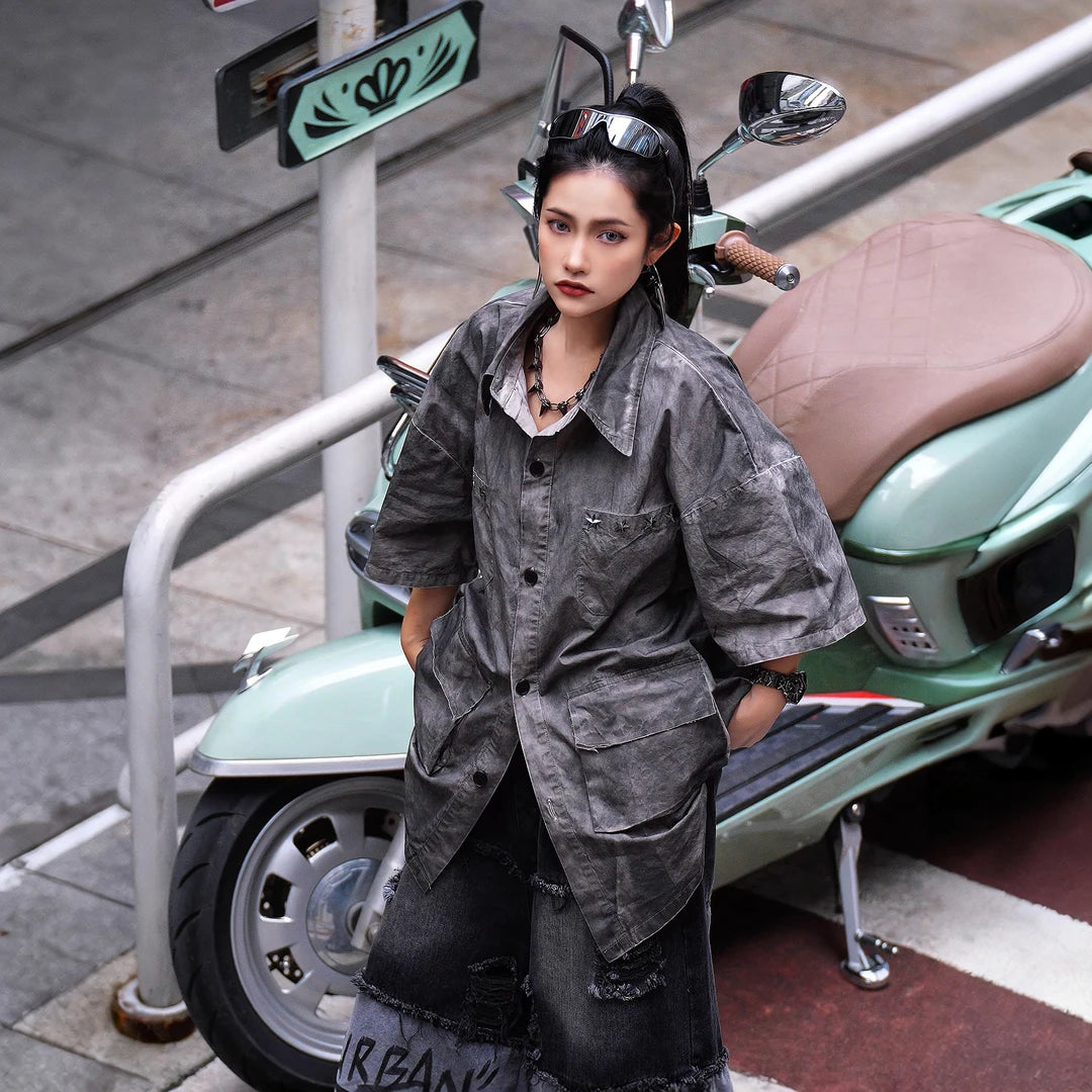 Sanhoostudio short sleeve shirt featuring vintage streetwear styling, a relaxed oversized silhouette, and lightweight breathable fabric. Perfect for casual summer outfits with timeless design and everyday comfort.
