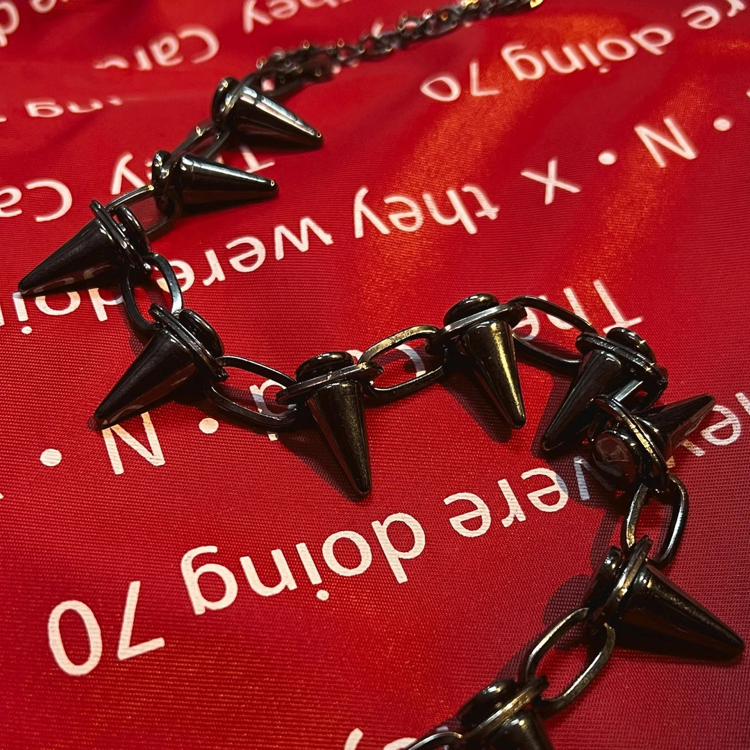 Sanhoostudio titanium steel necklace featuring a minimalist chain design with durable construction and versatile styling. Perfect for everyday layering with streetwear, casual, and modern fashion outfits.