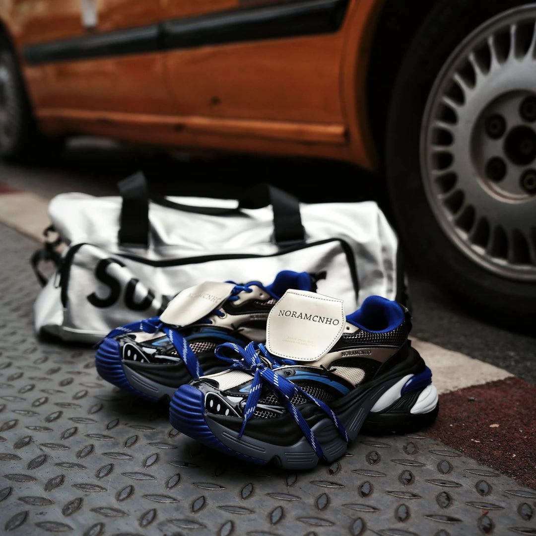 Sanhoostudio dad sneakers featuring a Klein blue colorway, deconstructed lace-up design, and cushioned sole construction. Built for all-day comfort with versatile streetwear styling and a bold contemporary aesthetic.