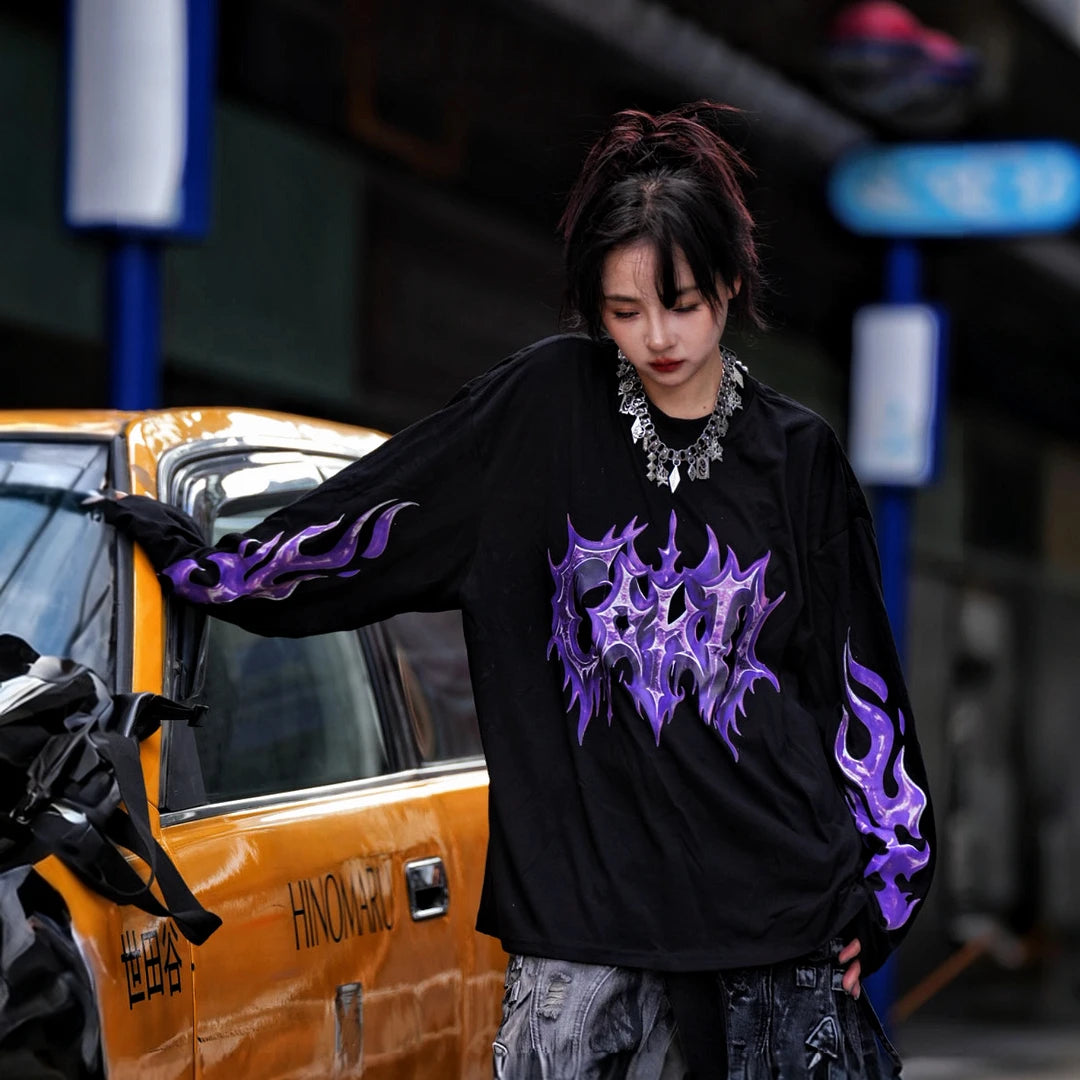 Sanhoostudio short sleeve T-shirt featuring purple-toned hand-painted artwork, contrast patchwork detailing, and a relaxed oversized silhouette. Designed for bold summer streetwear styling with expressive visual texture, comfortable everyday wear, and a distinctive high-street aesthetic.