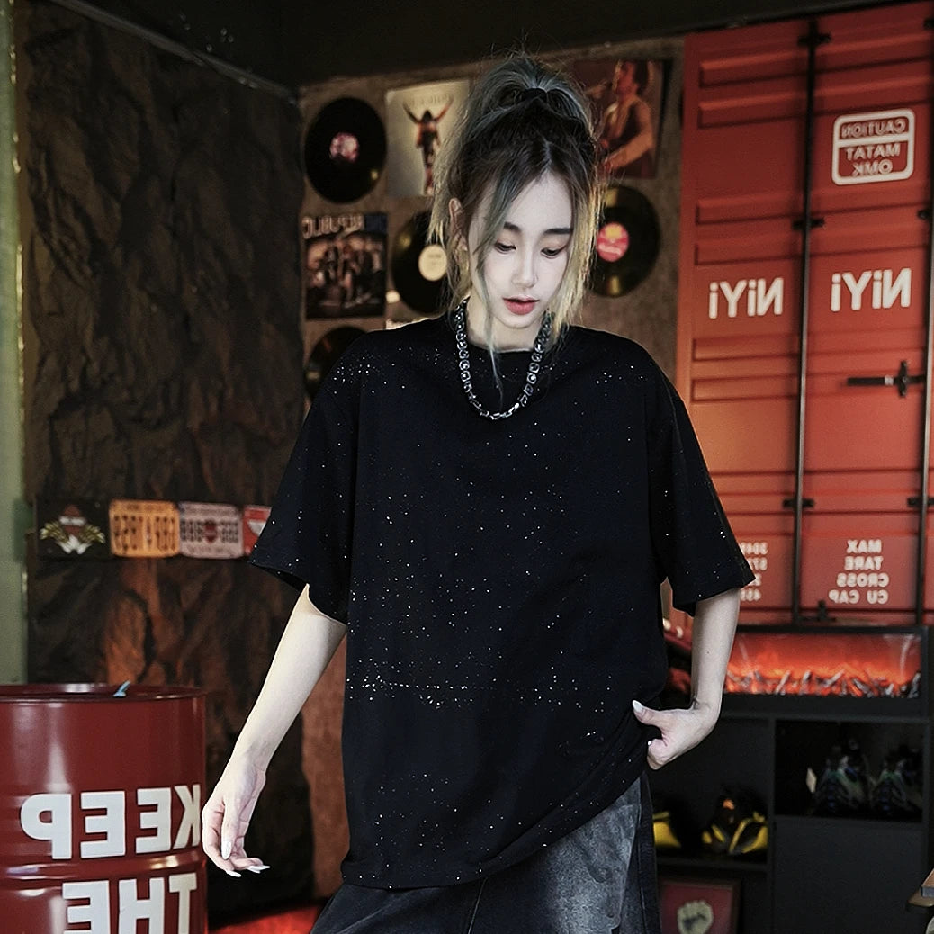 Sanhoostudio short sleeve T-shirt featuring an all-over star-inspired graphic design and a relaxed oversized silhouette. Designed for summer streetwear styling with comfortable everyday wear, bold visual appeal, and versatile pairing with denim or cargo pants.