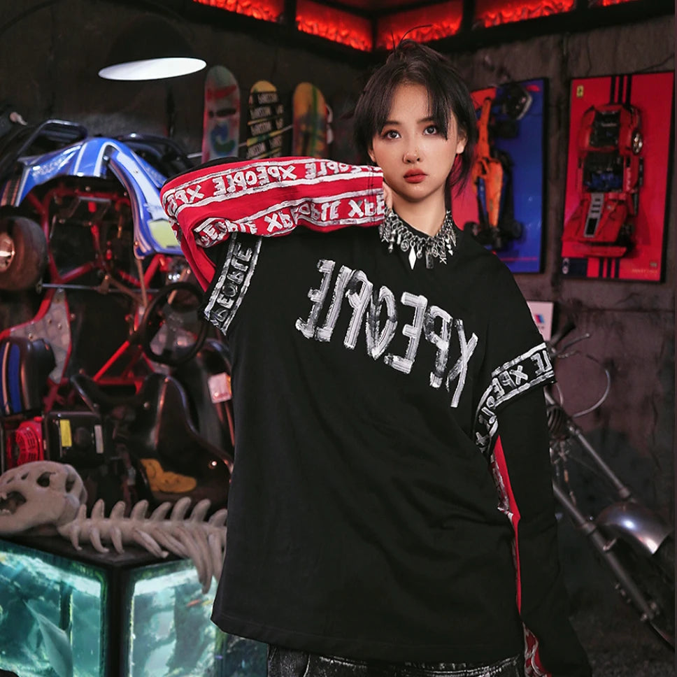 Sanhoostudio short sleeve T-shirt featuring hand-painted artwork, contrast patchwork detailing, and a relaxed oversized silhouette. Designed for bold high-street styling with expressive visual texture, breathable everyday comfort, and a distinctive hip-hop inspired streetwear aesthetic.
