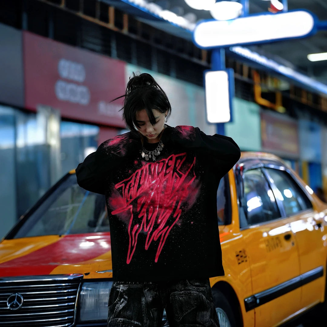 Sanhoostudio long sleeve T-shirt featuring red galaxy-inspired digital graphics, lightweight fabric construction, and a relaxed oversized silhouette. Designed for effortless layering with bold visual impact, breathable everyday comfort, and versatile streetwear styling.