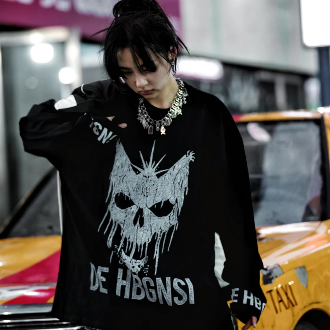 Sanhoostudio long sleeve T-shirt featuring statement digital print graphics, lightweight construction, and a relaxed oversized silhouette. Designed for dark streetwear styling and effortless layering with breathable comfort, bold visual character, and versatile everyday wear.