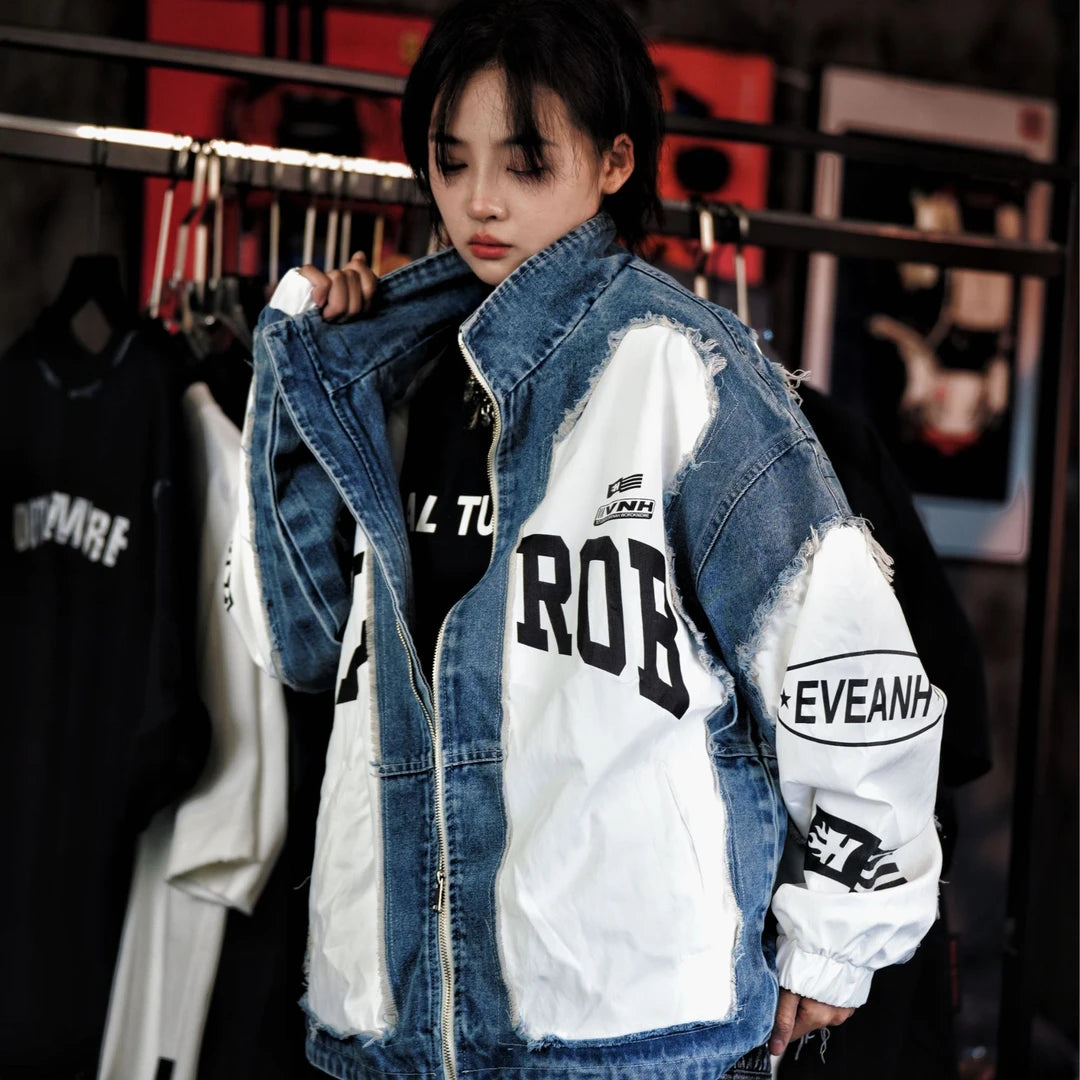 Sanhoostudio denim jacket featuring a cobalt blue colorway, digital print artwork, distressed detailing, and patchwork construction with a relaxed oversized silhouette. Designed for statement streetwear layering with bold visual texture, rugged denim character, and versatile everyday styling.