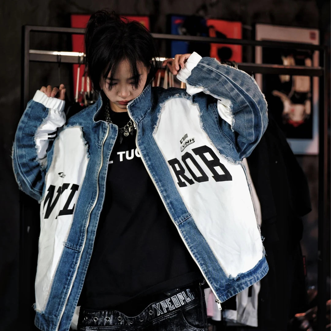 Sanhoostudio denim jacket featuring a cobalt blue colorway, digital print artwork, distressed detailing, and patchwork construction with a relaxed oversized silhouette. Designed for statement streetwear layering with bold visual texture, rugged denim character, and versatile everyday styling.