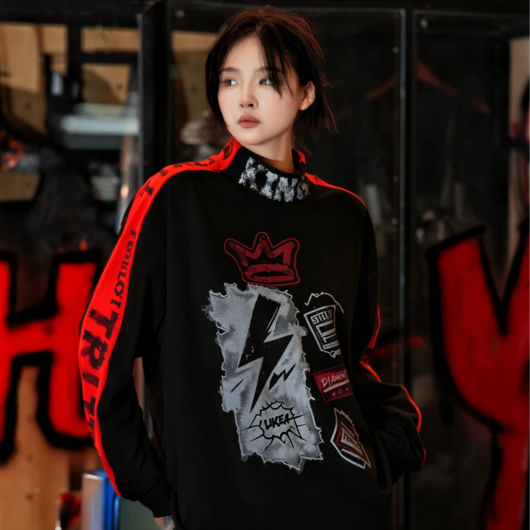 Sanhoostudio thermal long sleeve T-shirt featuring graffiti-inspired scan graphics, soft thermal fabric, asymmetric detailing, and a relaxed oversized silhouette. Designed for contemporary streetwear layering with comfortable warmth, distinctive digital artwork, and versatile everyday styling.