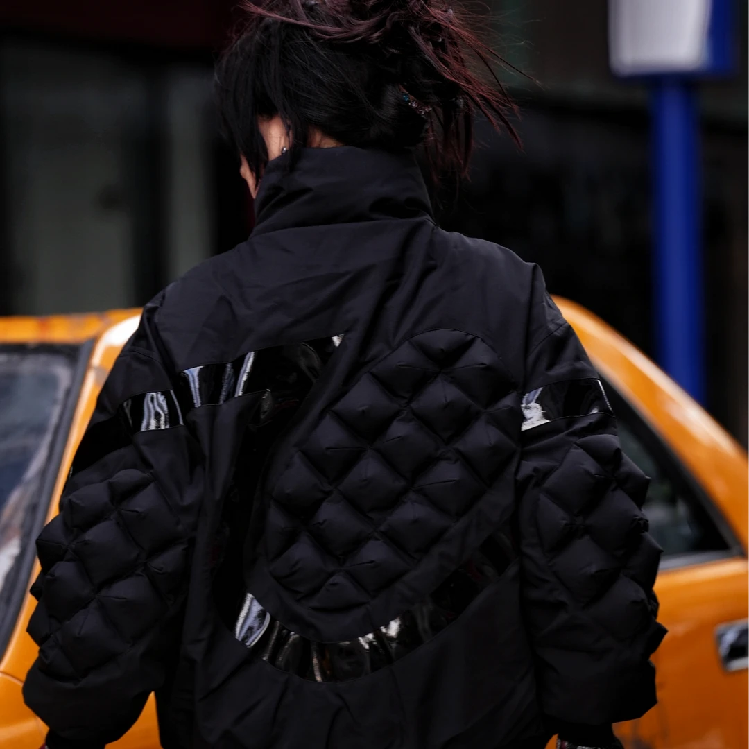 Sanhoostudio cropped down jacket featuring 90% down filling, handcrafted distressed detailing, stain-effect washed textures, and a structured stand collar. Designed for winter streetwear styling with lightweight insulation, comfortable warmth, relaxed proportions, and a bold contemporary silhouette.