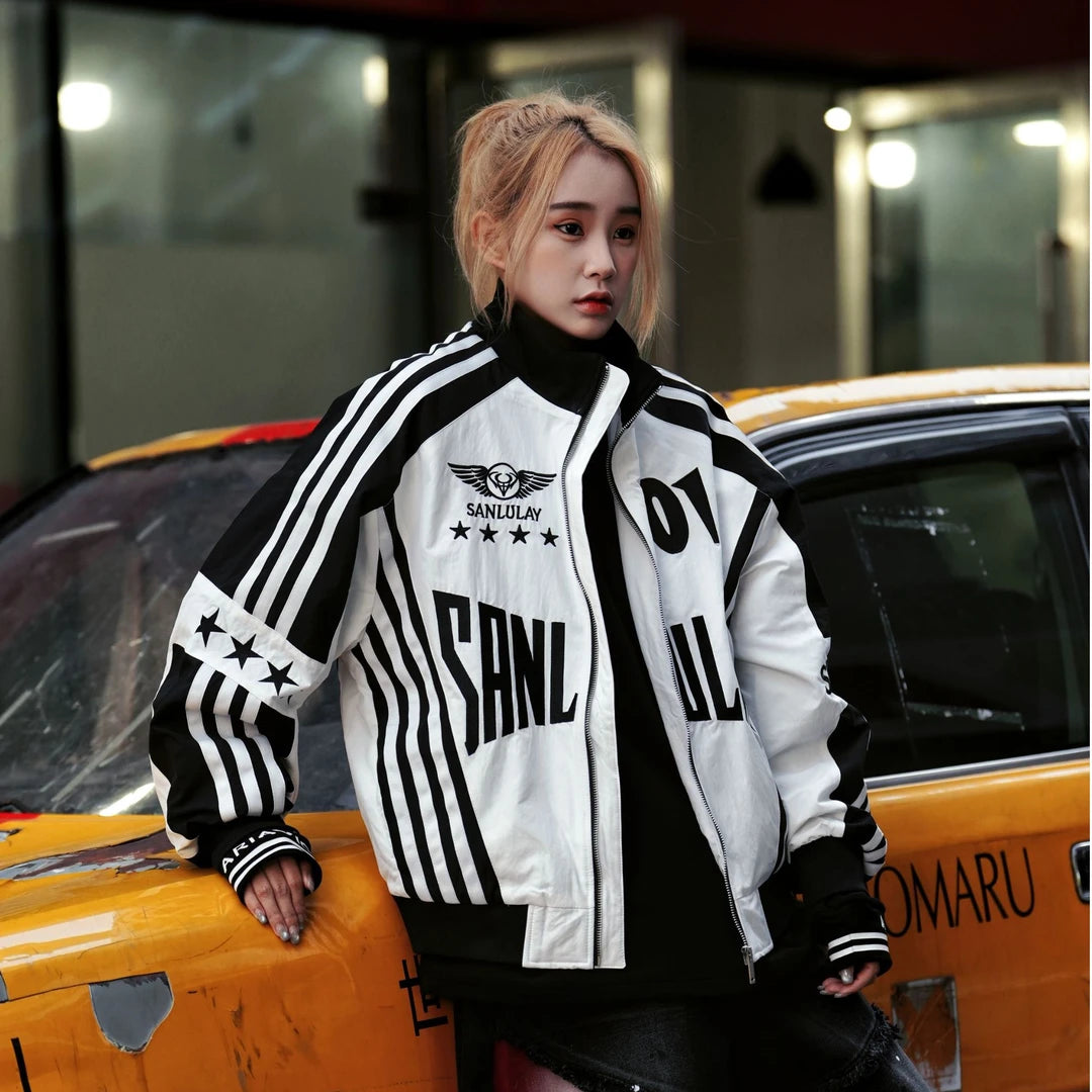 Sanhoostudio padded jacket featuring bold colorblock panels, patchwork construction, and a relaxed oversized silhouette. Designed for fall and winter streetwear styling with comfortable insulation, distinctive contrasting colors, versatile layering, and a modern unisex aesthetic.