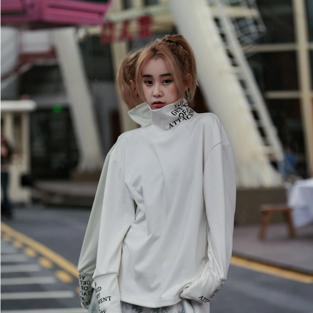 Sanhoostudio thermal long sleeve T-shirt featuring a protective high neckline, soft fleece fabric, and a relaxed oversized silhouette. Designed for comfortable fall and winter layering with gentle warmth, flexible everyday wear, versatile styling, and modern unisex streetwear appeal.
