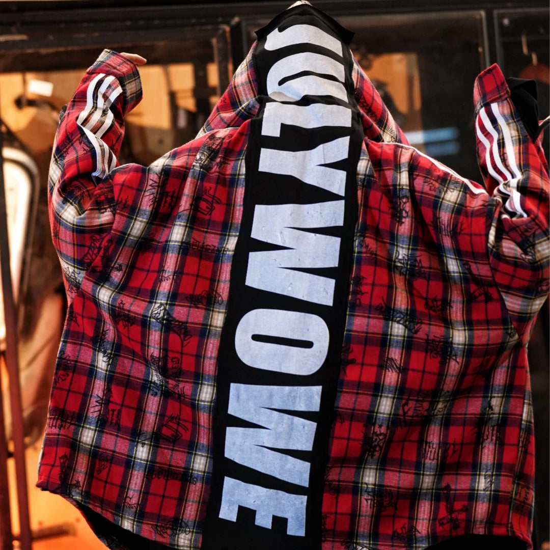 Sanhoostudio fleece-lined jacket featuring red plaid-inspired graphic detailing, digital print artwork, patchwork construction, and a relaxed oversized silhouette. Designed for fall and winter streetwear styling with comfortable warmth, distinctive contrasting textures, versatile layering, and bold contemporary appeal.