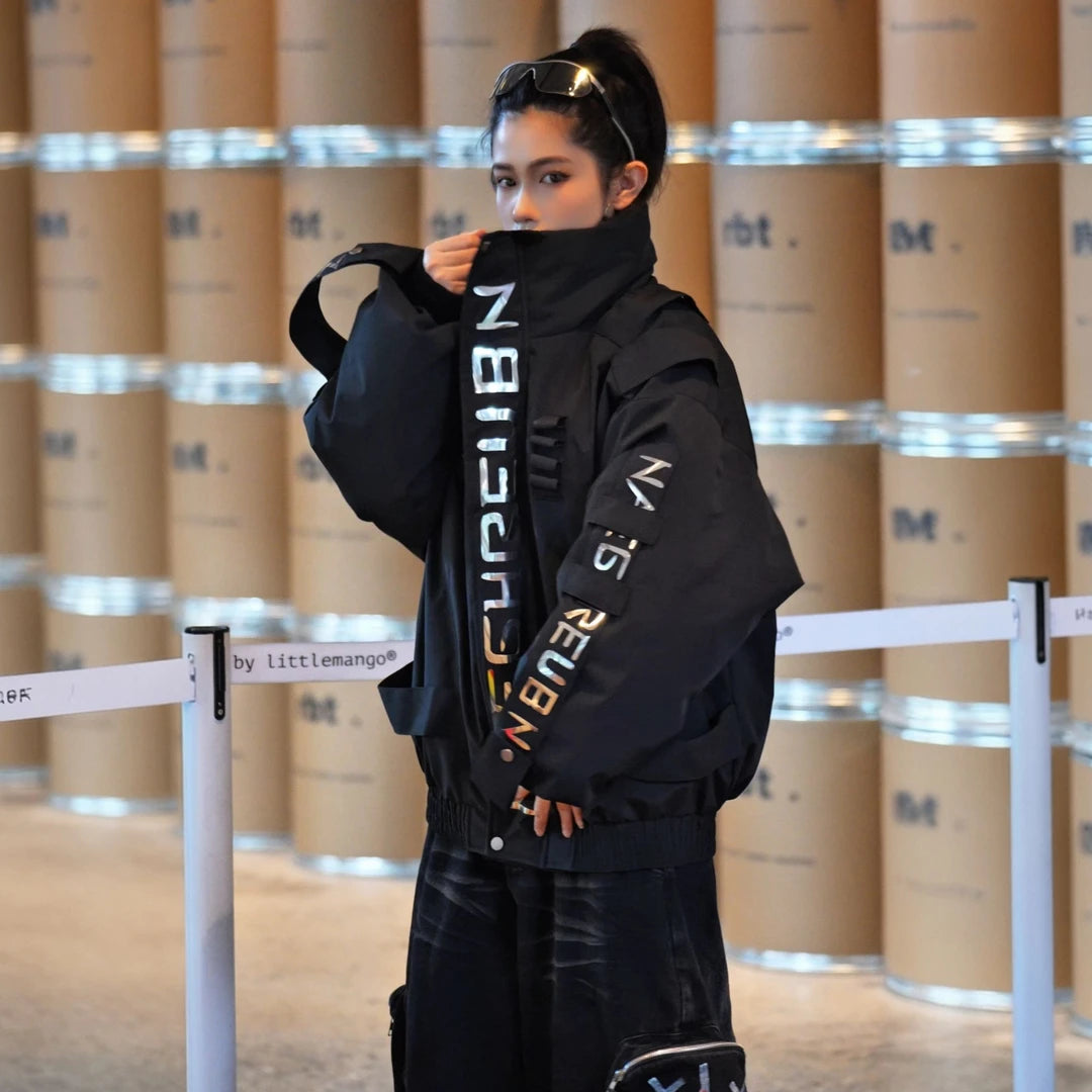 Sanhoostudio down jacket featuring reflective letter graphics, a structured stand collar, and a relaxed oversized silhouette. Designed for technical-inspired winter streetwear styling with comfortable insulation, bold reflective detailing, functional aesthetics, and versatile everyday layering.