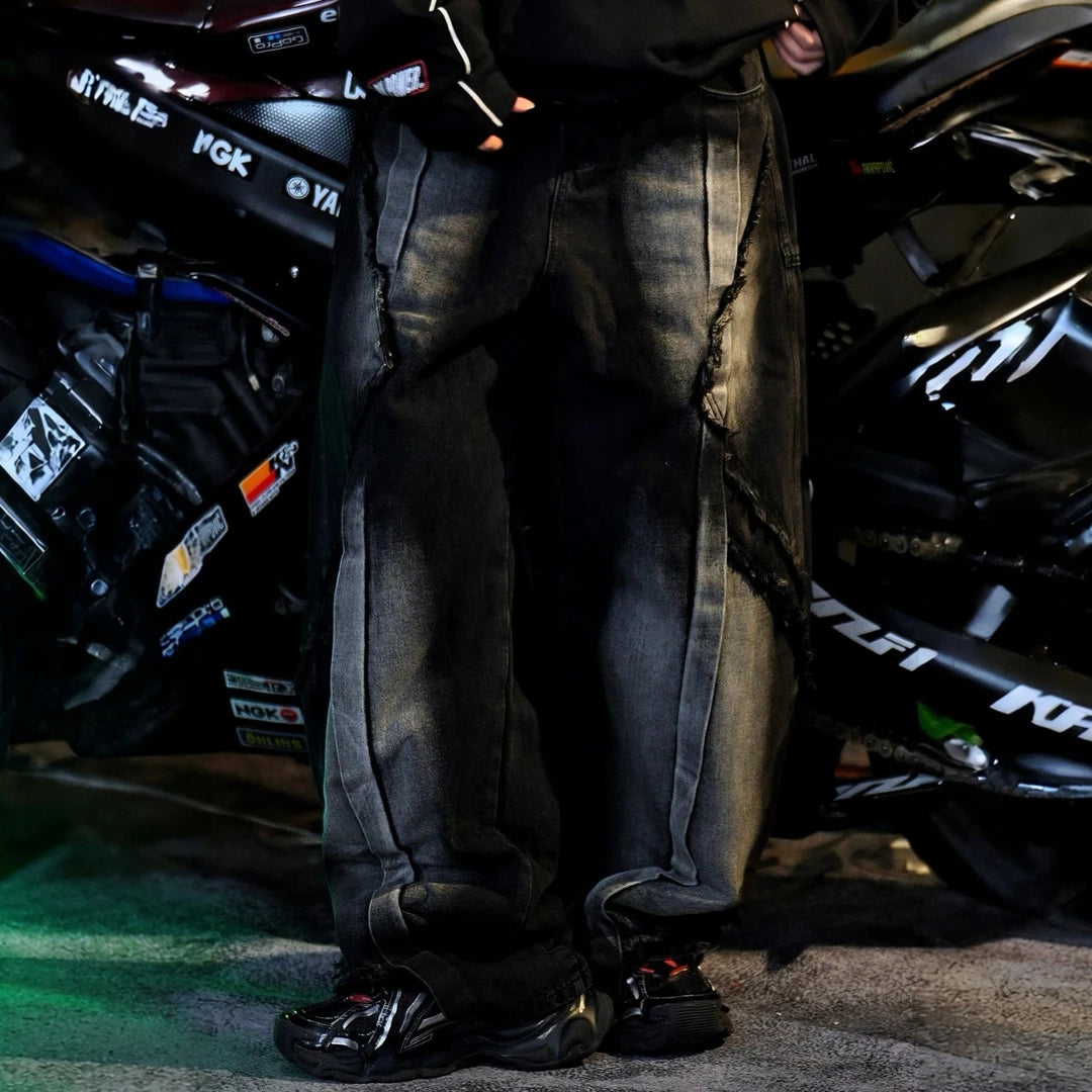 Sanhoostudio denim pants featuring heavyweight black denim, vintage washed treatment, and an oversized wide leg silhouette with an extended floor-length cut. Designed for contemporary American streetwear styling with rugged denim texture, relaxed proportions, comfortable everyday wear, and effortless urban appeal.