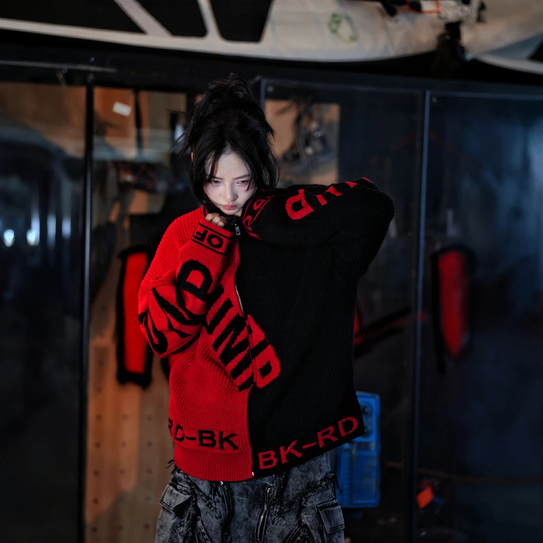 Sanhoostudio knit sweater featuring a contrasting black and red colorway, heavyweight knitted construction, subtitle-inspired graphic details, distressed graffiti artwork, and hand-painted patchwork elements. Designed with a relaxed oversized silhouette for statement streetwear styling, comfortable warmth, and appeal.