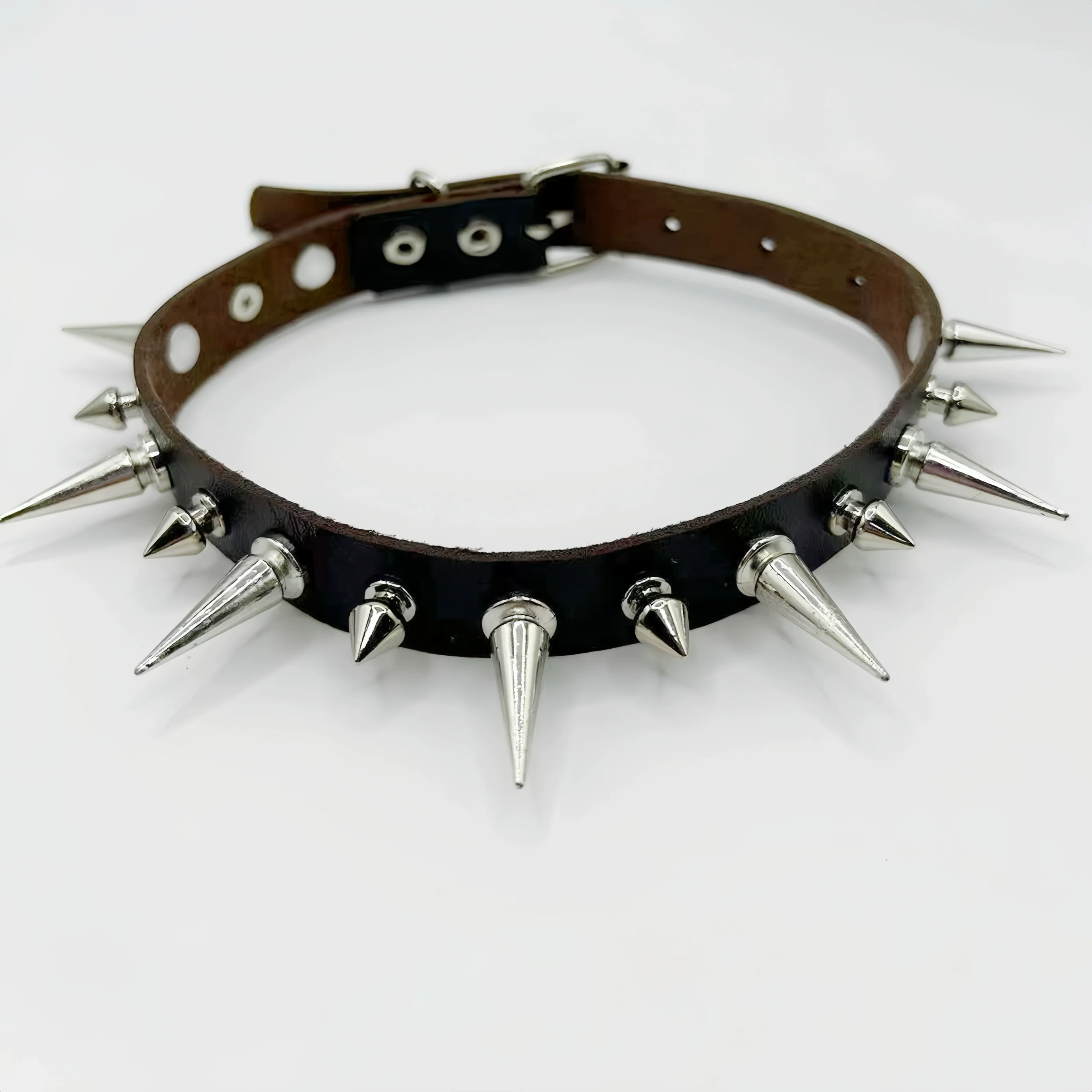 Discover Sanhoostudio’s rock studded punk leather choker, blending Y2K subculture aesthetics with bold metal detailing for a rebellious, fashion-forward accessory that elevates streetwear outfits.