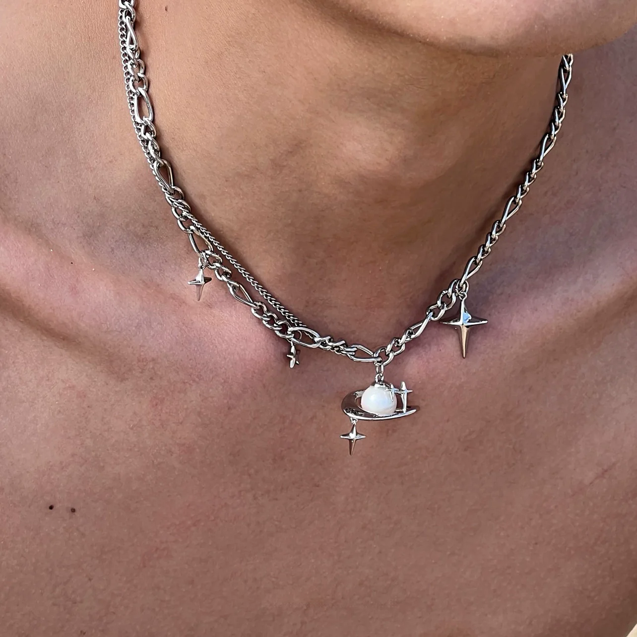 Discover the star geometric pearl layered necklace from Sanhoostudio, designed with chic pearl details and modern double chain style. Perfect for layering with streetwear or luxury outfits. Shop necklaces now at Sanhoostudio.