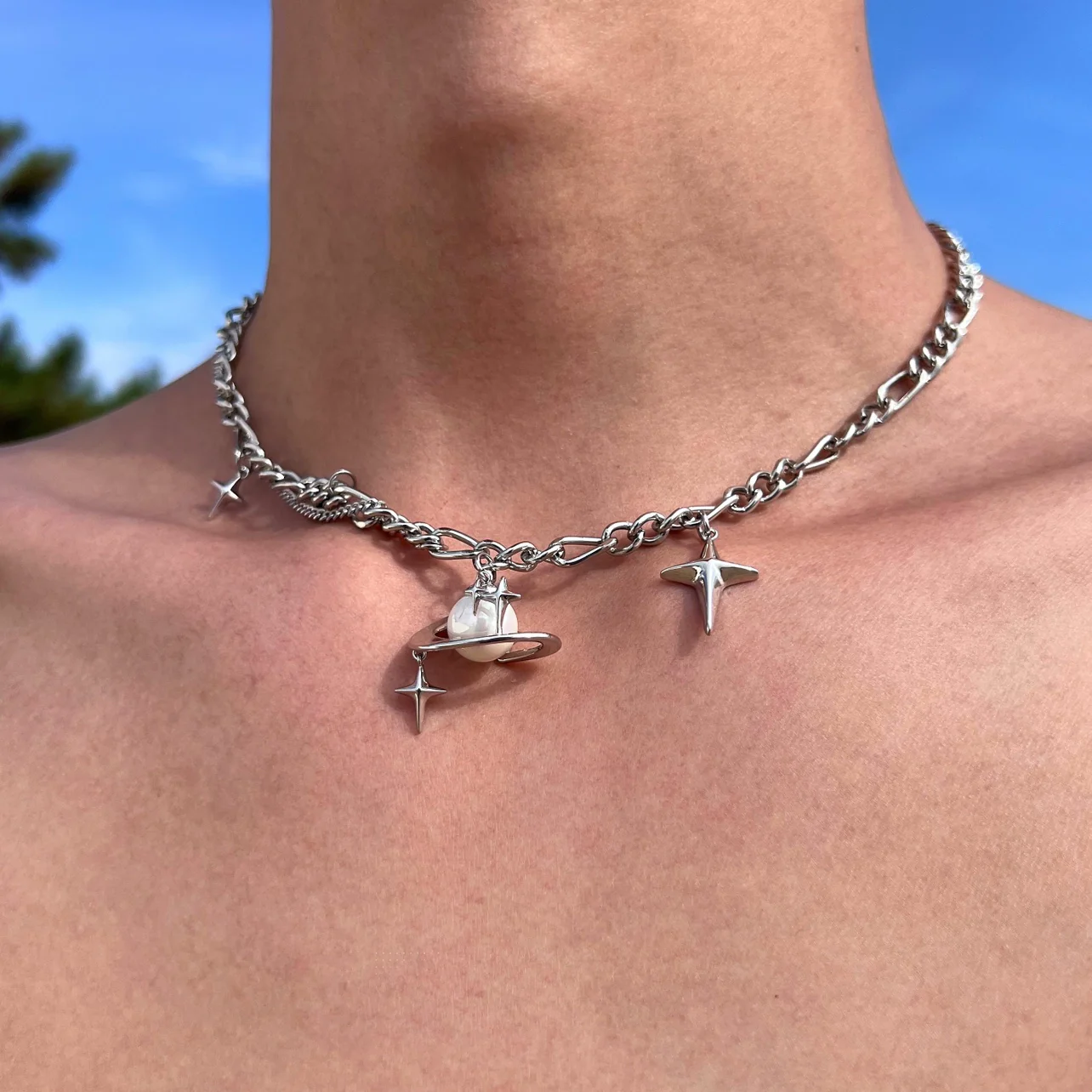 Discover the star geometric pearl layered necklace from Sanhoostudio, designed with chic pearl details and modern double chain style. Perfect for layering with streetwear or luxury outfits. Shop necklaces now at Sanhoostudio.