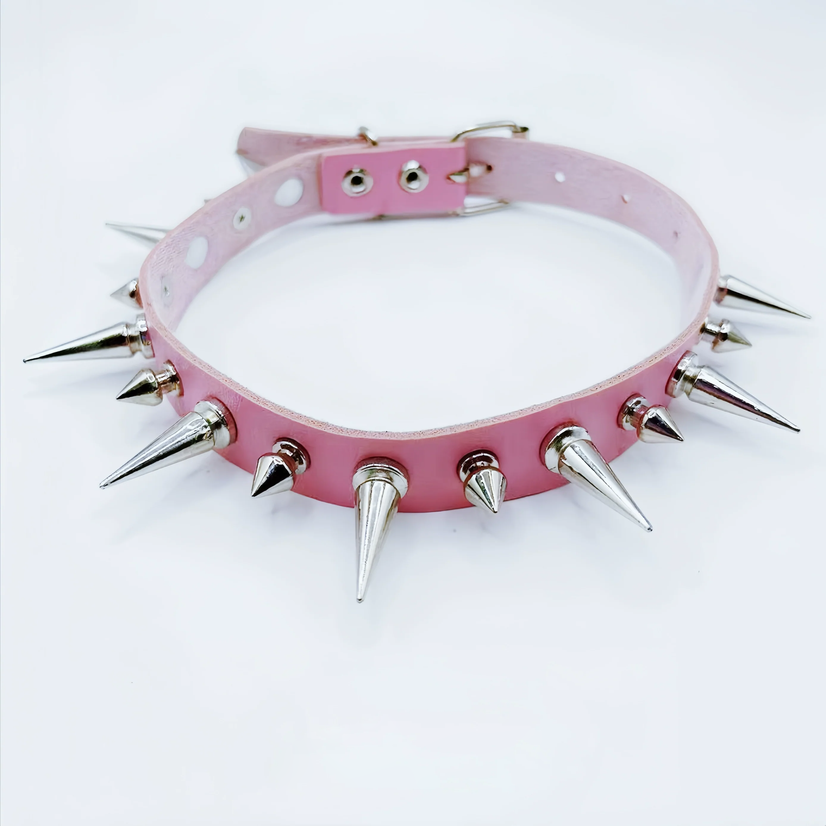 Discover Sanhoostudio’s rock studded punk leather choker, blending Y2K subculture aesthetics with bold metal detailing for a rebellious, fashion-forward accessory that elevates streetwear outfits.