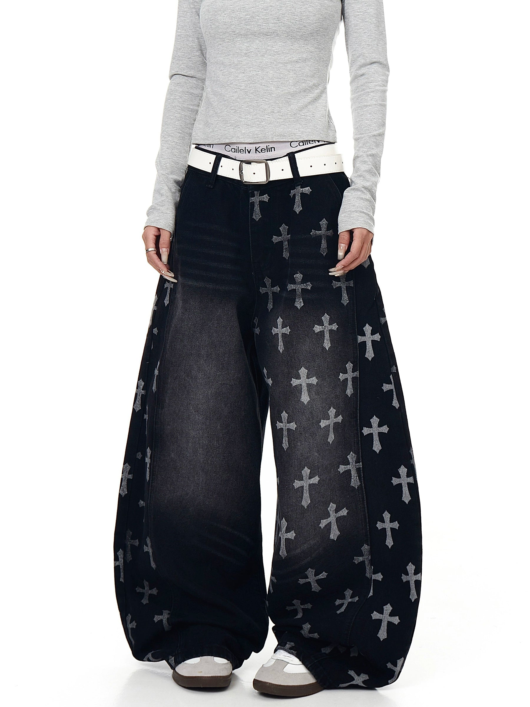 An icon of gothic rebellion — cross-printed denim with a relaxed wide-leg silhouette. Designed for high-street dreamers and underground believers by SanhooStudio.