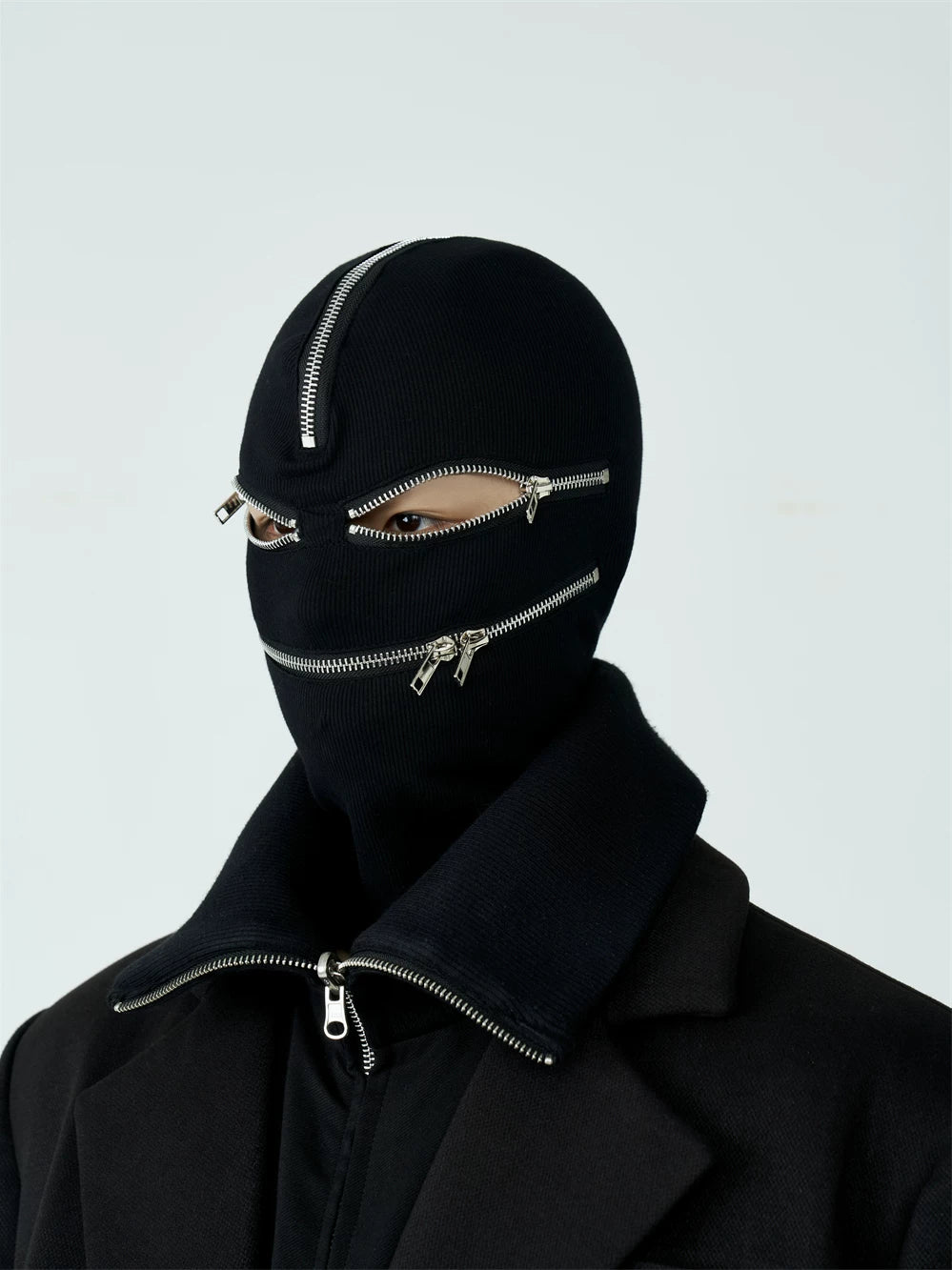 Sanhoostudio black and white zip-up hood mask designed for unisex streetwear styling. Featuring a full zip closure, foldable structure, and warm layered design for casual spring wear.