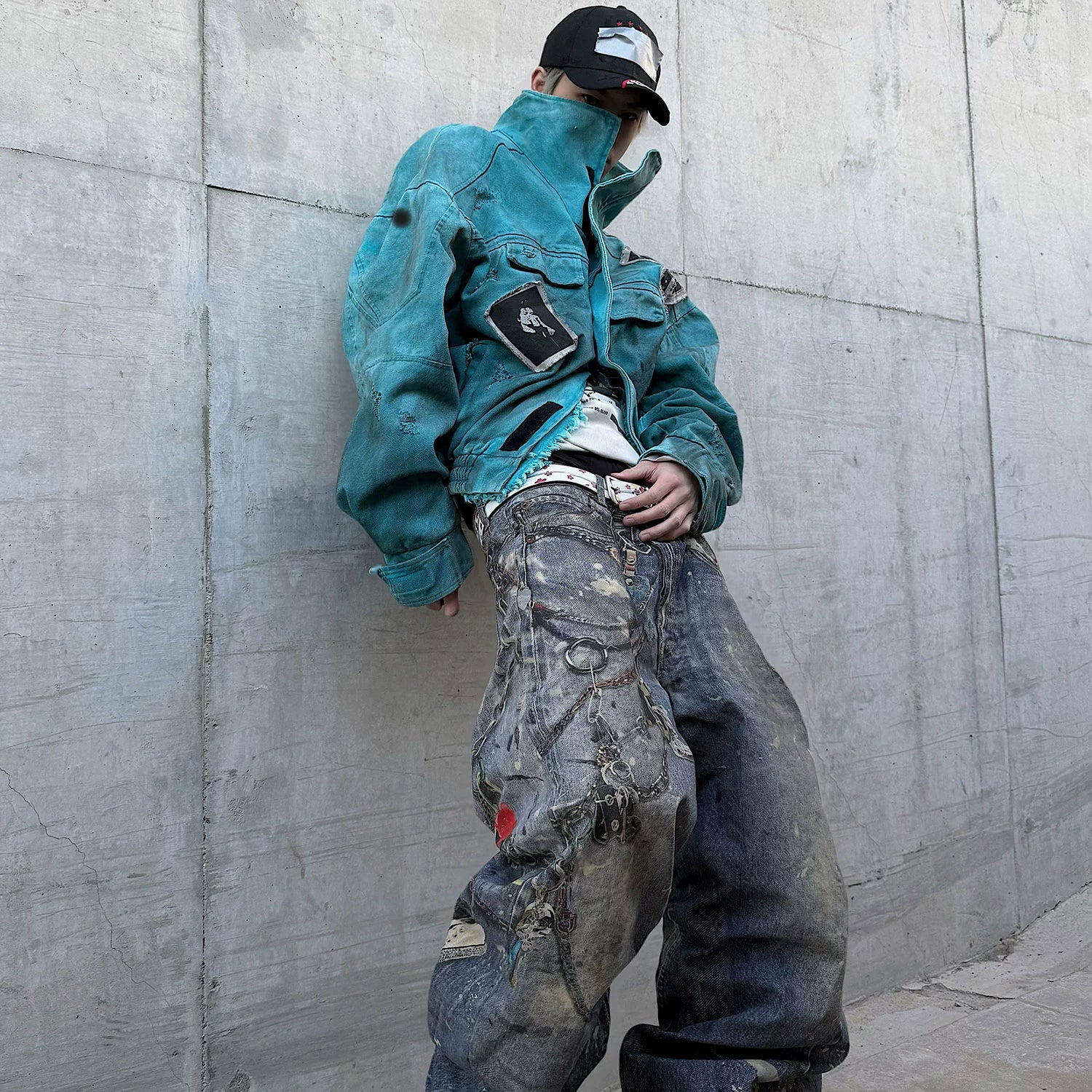 Sanhoostudio vintage-inspired canvas jacket crafted from 100% cotton. Featuring patchwork distressing, dyed finish, and a structured oversized fit that defines modern denim street style for all genders.