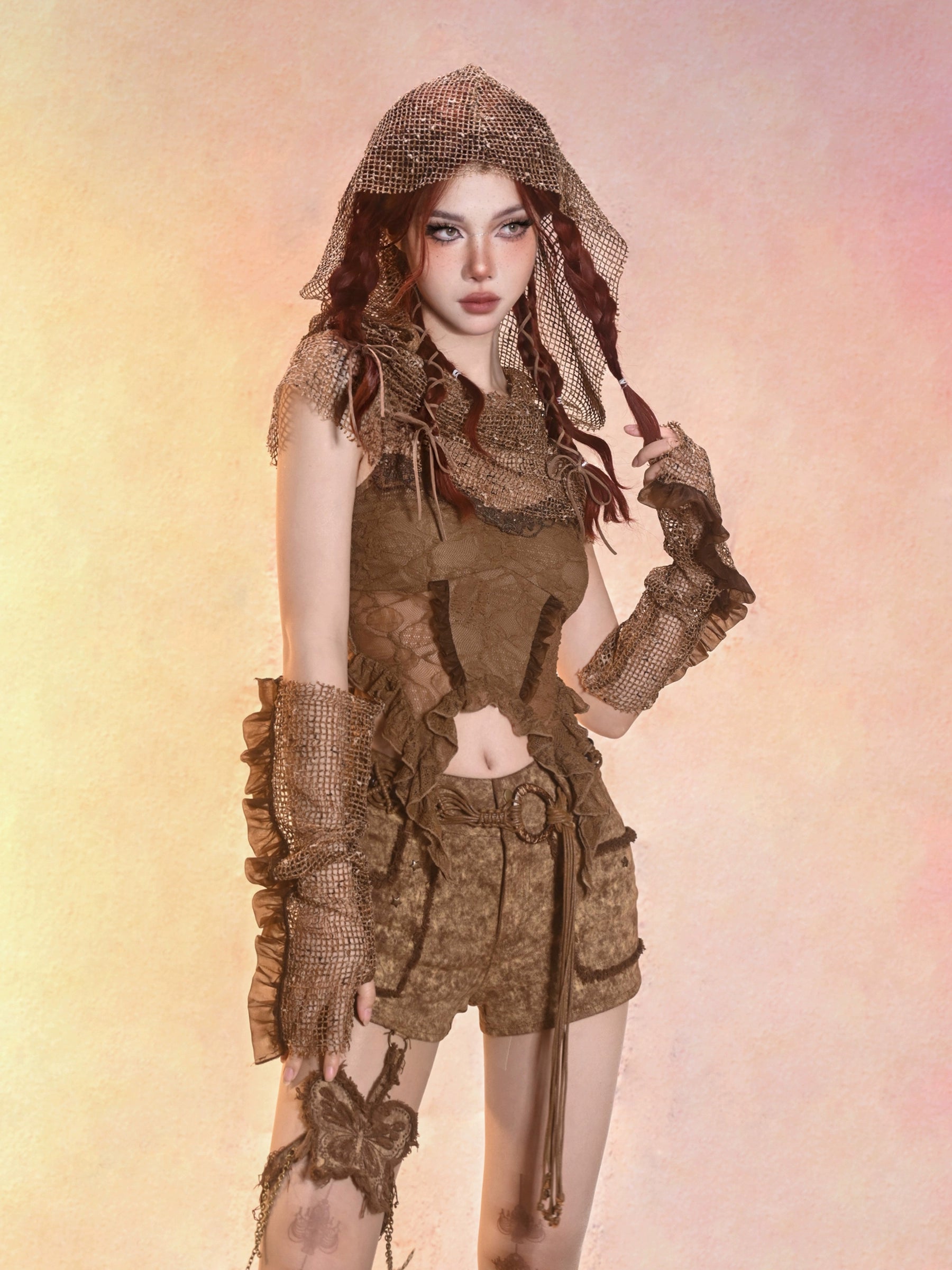 Sanhoostudio Lace Hollow Tank Top made from 100% polyester features retro punk style with lace cut-out details. Perfect for summer layering, streetwear, and casual festival outfits.