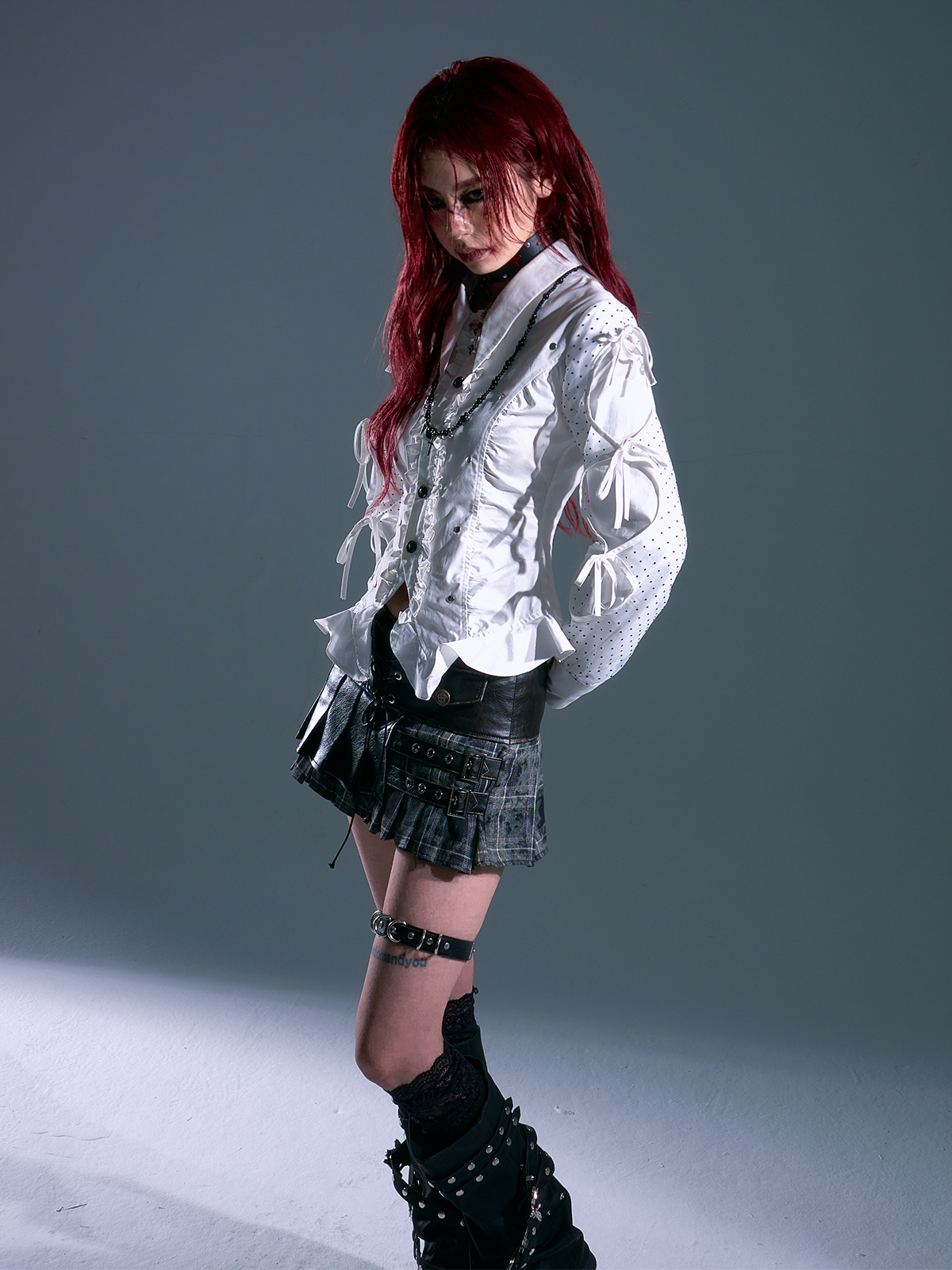 Sanhoostudio’s retro polka dot ruffled waist shirt features a slim fit, delicate tie details, and vintage-inspired elegance. Perfect for stylish streetwear and casual chic outfits.