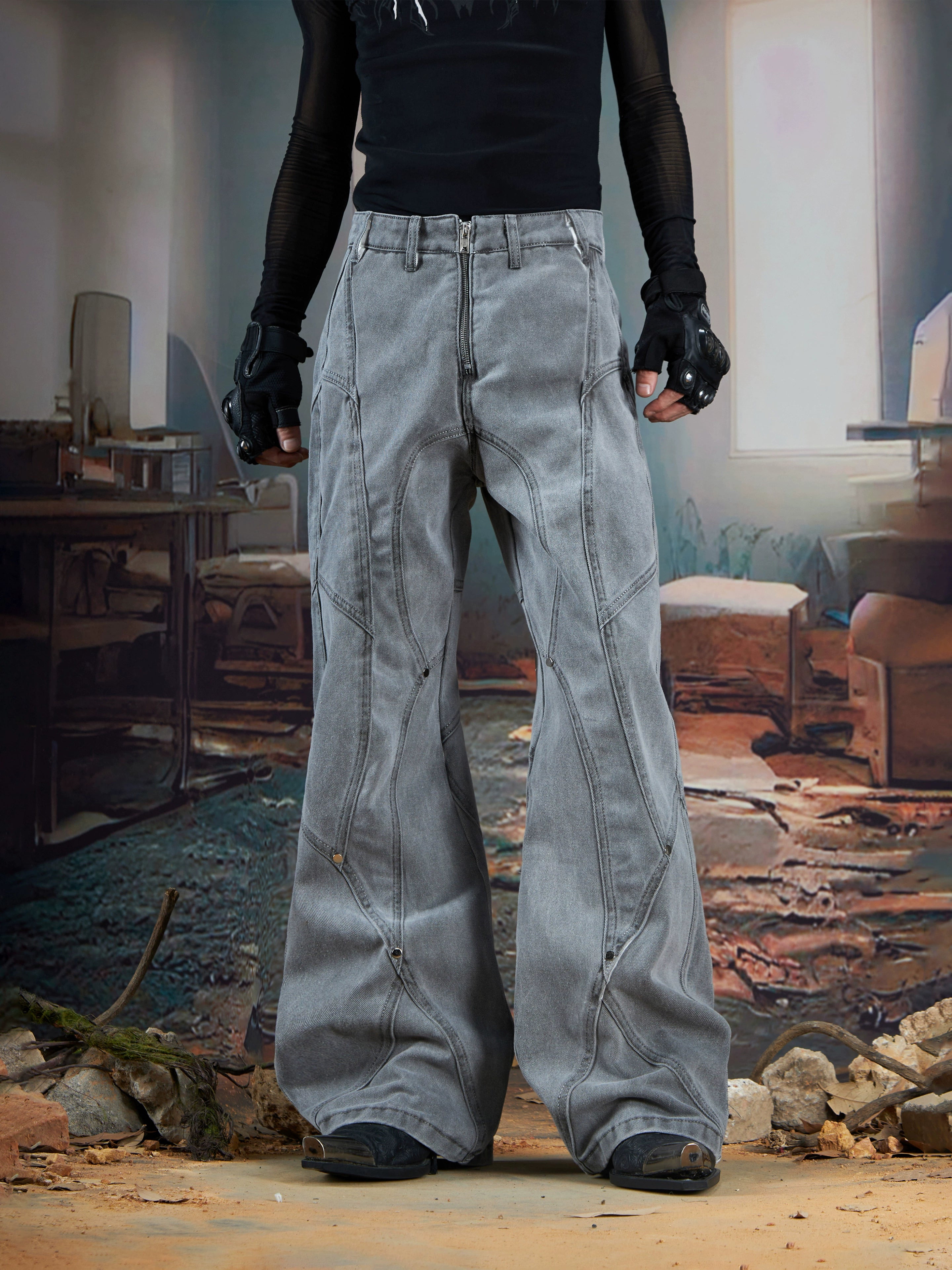 Rock an edgy look with these dark studded denim jeans, designed with structured panels and a slim-fit washed finish. Their subtle flare adds a touch of retro to punk-inspired outfits. Shop them at Sanhoostudio.