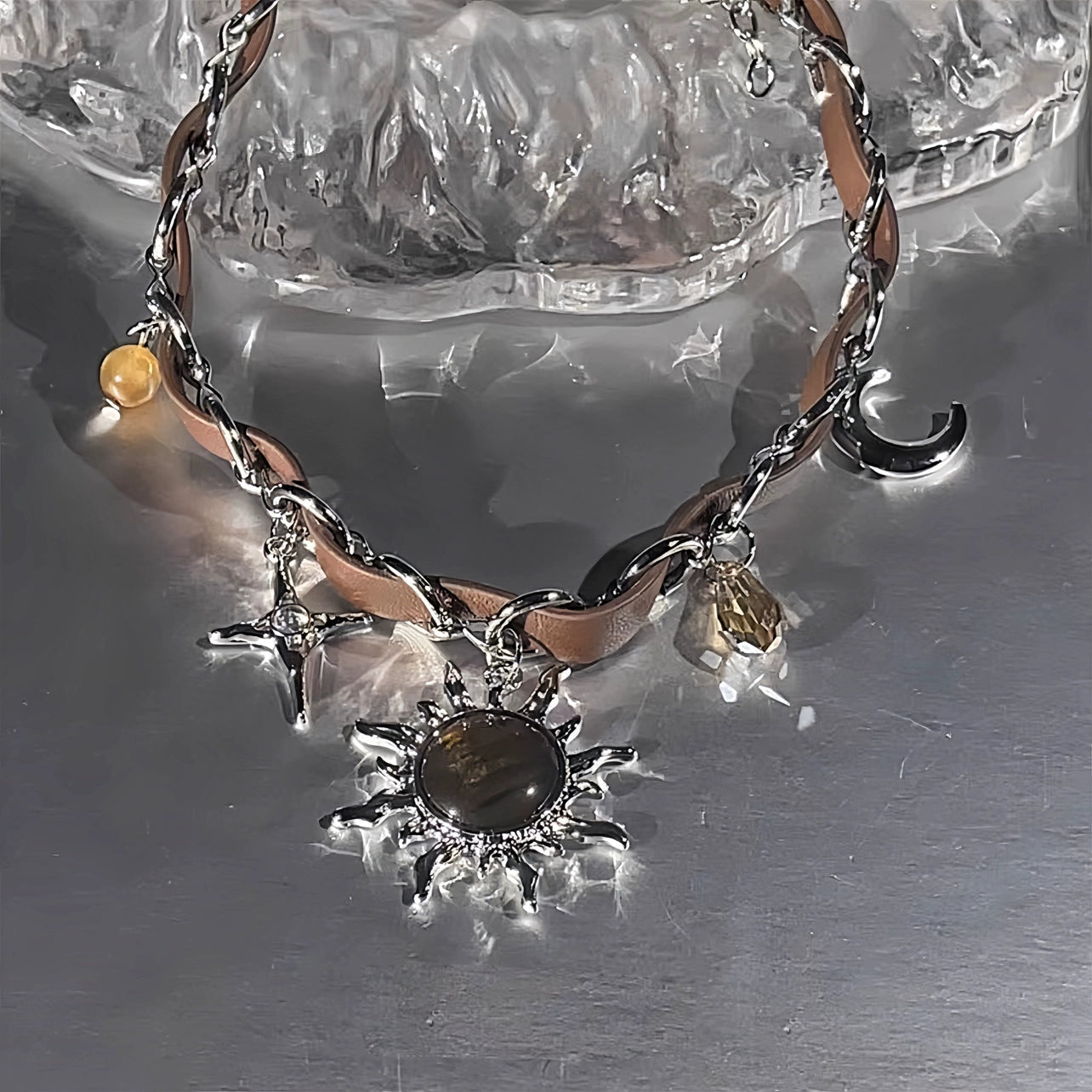 Sanhoostudio’s Mallard brown sunburst choker necklace showcases a bold sun-inspired design with warm brown tones, perfect for fashion-forward individuals seeking a standout, retro-luxe accessory.