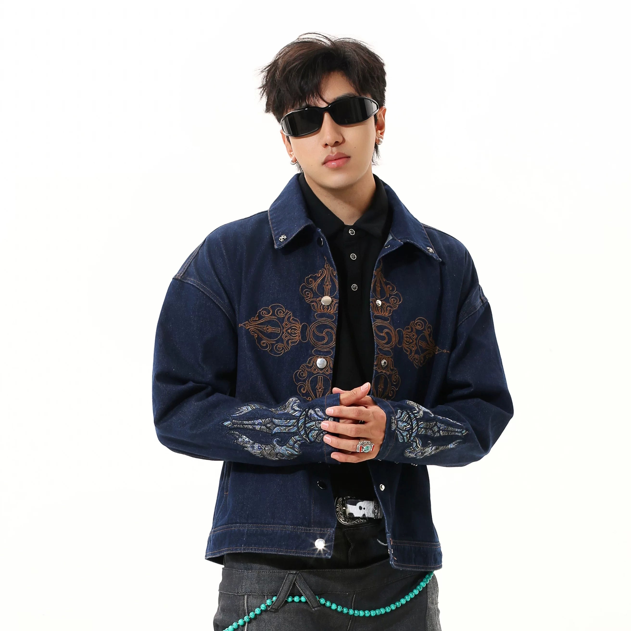Sanhoostudio denim jacket featuring Vajra embroidery and a relaxed streetwear silhouette. Designed for unisex wear with durable denim fabric for fall styling.