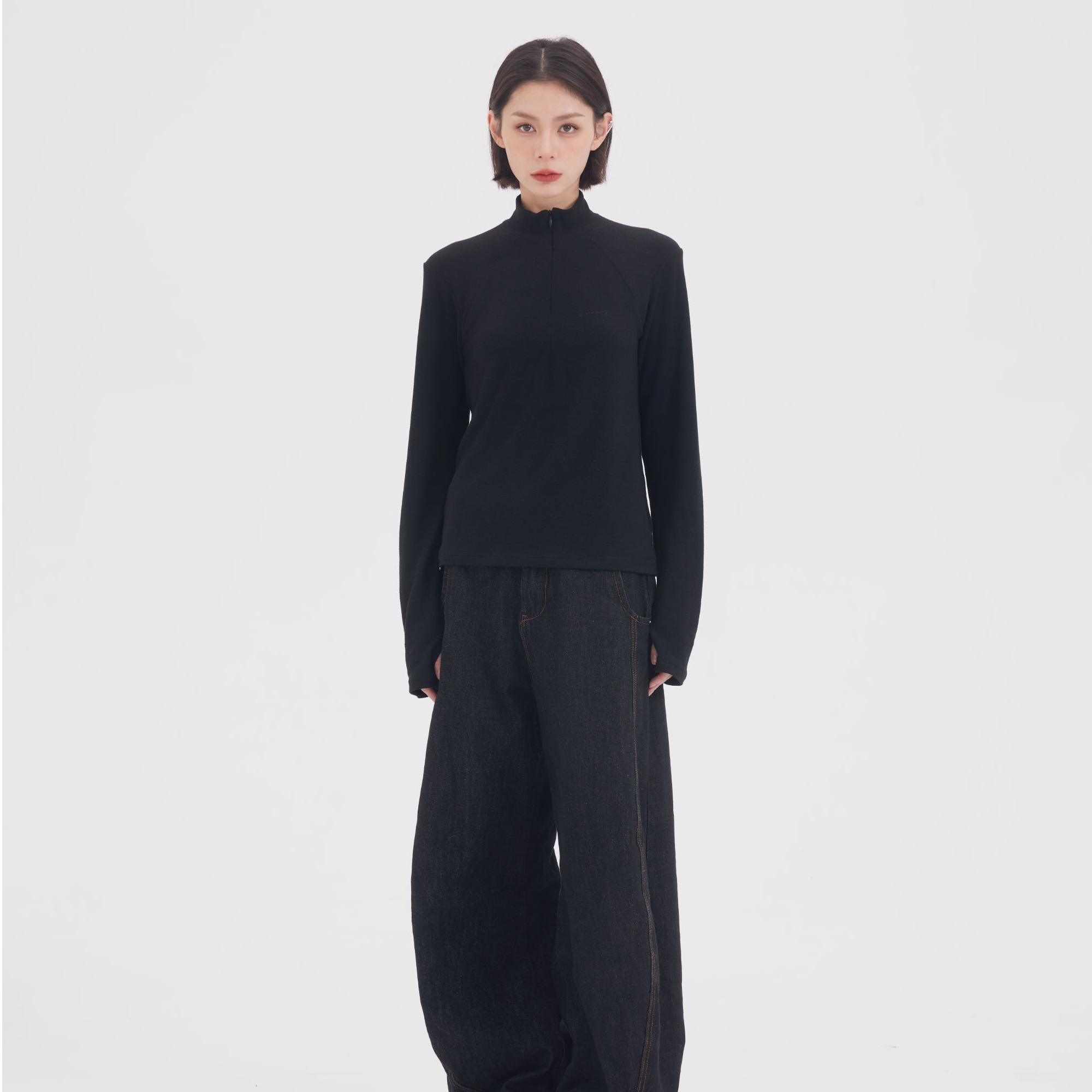 Sanhoostudio half-zip mock neck top designed for warmth and everyday layering. A unisex thermal essential for fall and winter.