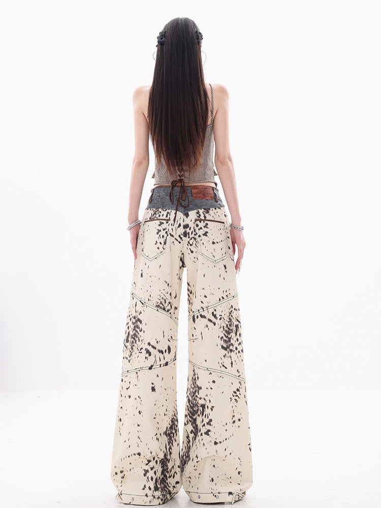 Sanhoostudio’s leopard print patchwork denim pants mix bold patterns with a relaxed straight-leg silhouette, creating a stylish fusion of retro and high-street fashion. A statement piece for standout looks.