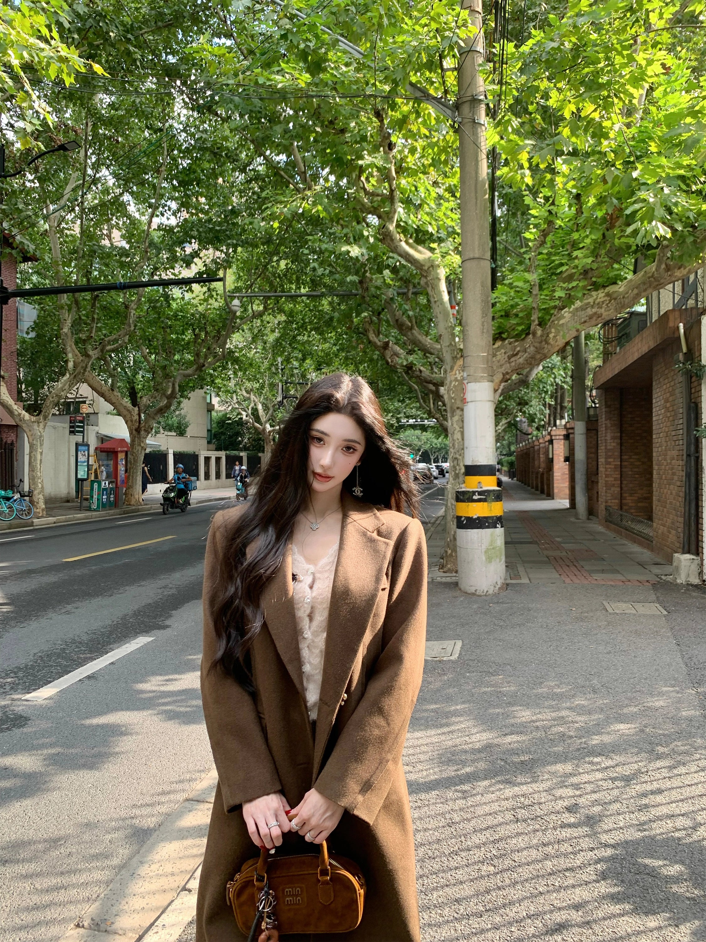 Stay cozy with the Classic Grey Wool Overcoat from Sanhoostudio, a refined outerwear piece offering warmth and elegance for autumn and winter seasons.