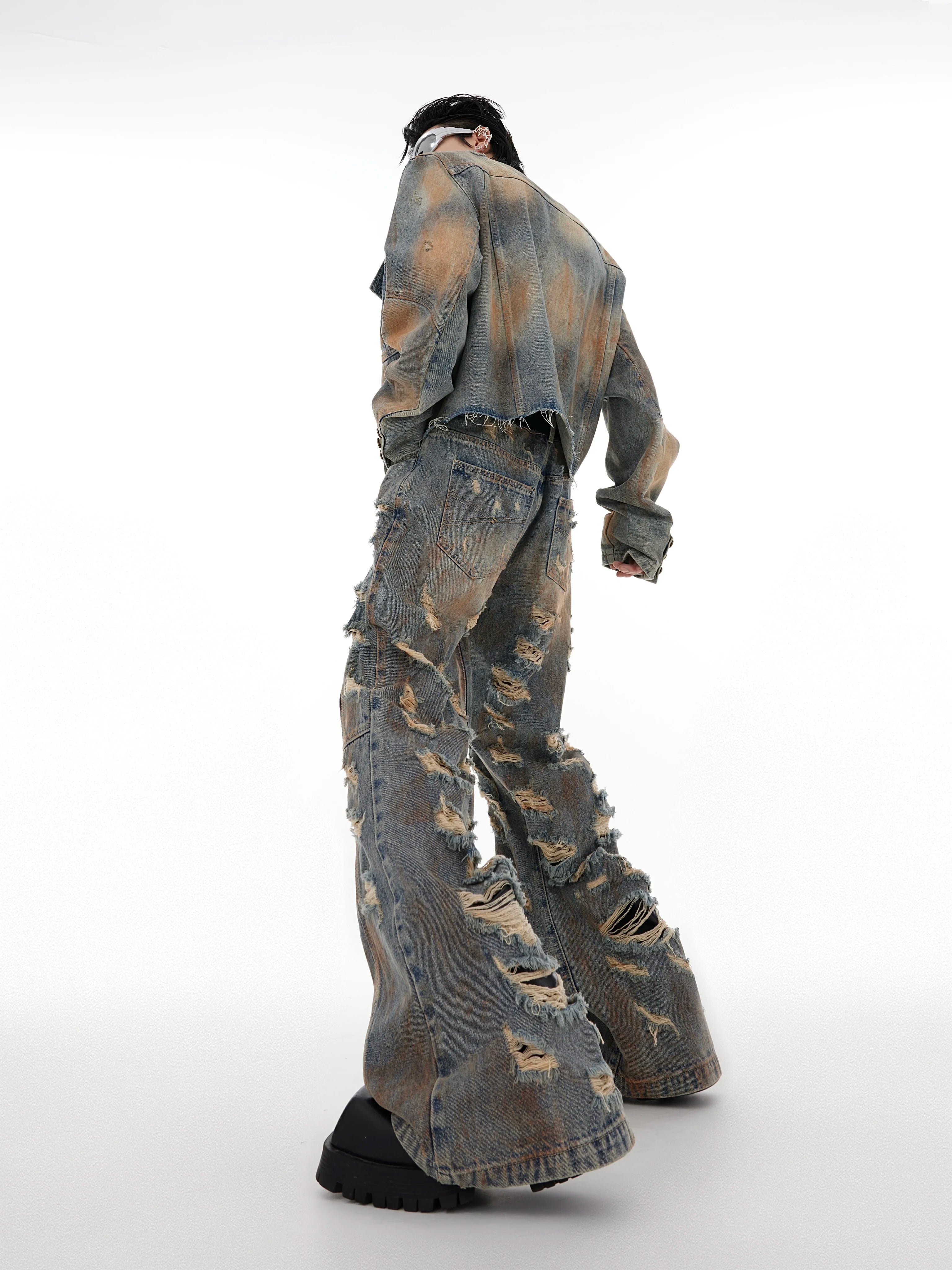 Sanhoostudio denim set featuring a distressed jacket and flared jeans. Designed with a vintage wasteland aesthetic and heavyweight washed finish.