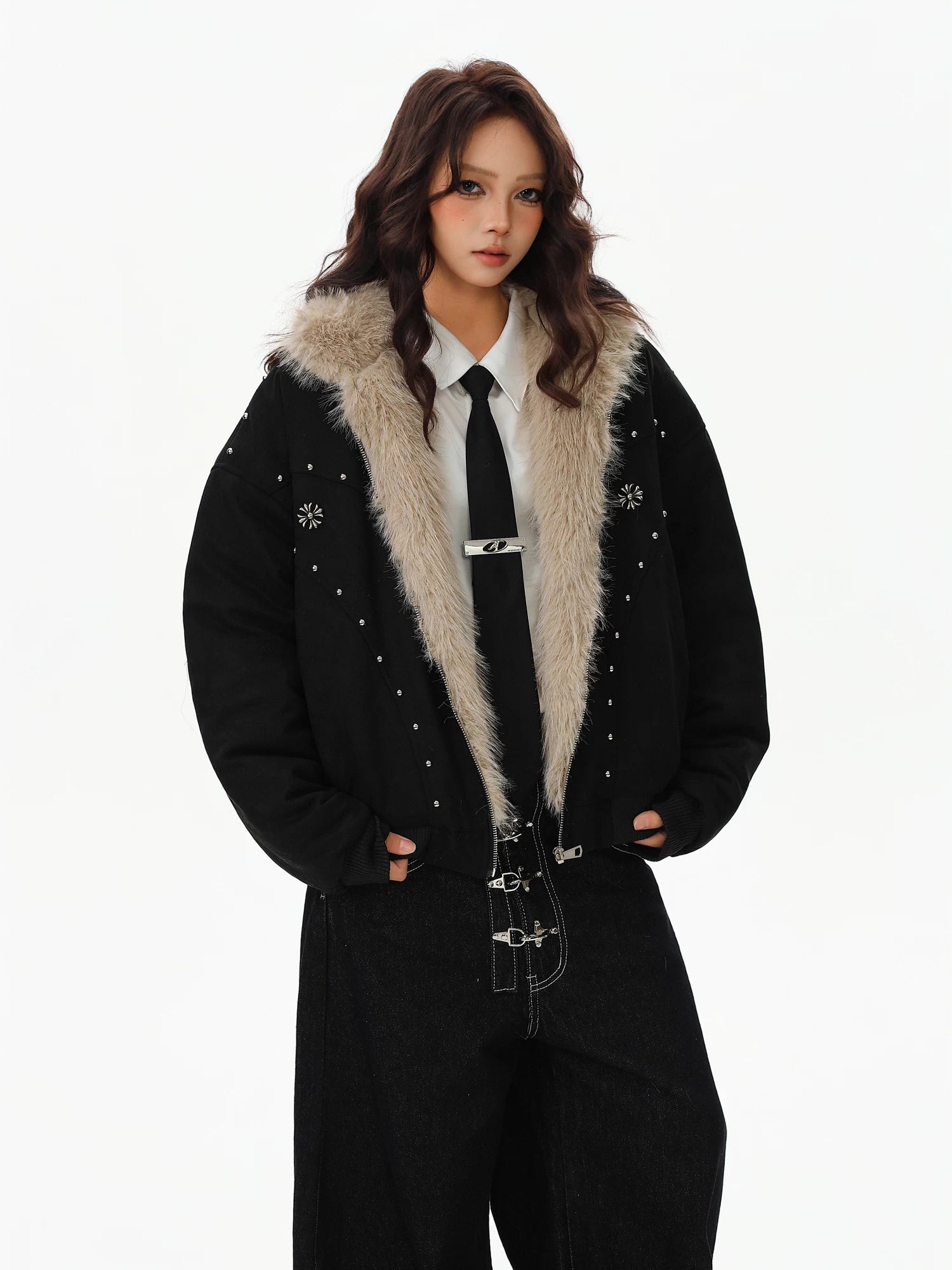 Sanhoostudio padded jacket with fur collar and hooded design, featuring mountain eagle detailing and stud accents. Built for warmth with a structured streetwear silhouette for winter styling.