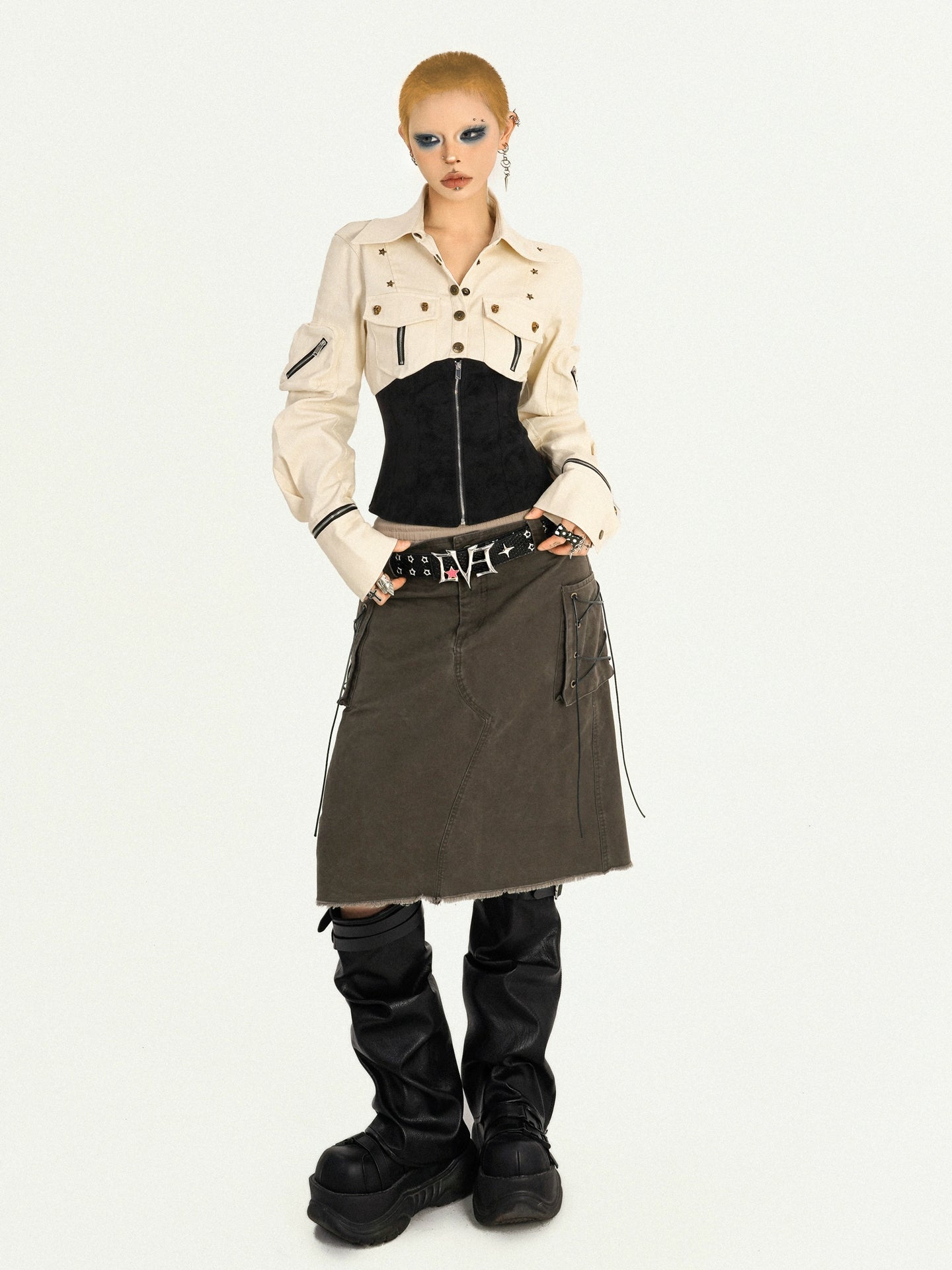 Sanhoostudio’s punk utility shirt fuses vintage edge and urban tailoring, featuring a zip-up front and waist-fitted silhouette for a confident fall look.