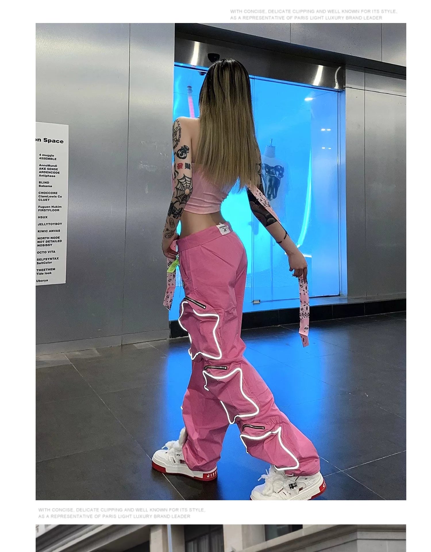 These reflective cargo pants from Sanhoostudio feature 3D star patches and bold avant-garde styling. The oversized fit and dark aesthetic make them ideal for nightwear, performance looks, or urban outfits, blending futuristic energy with functional streetwear practicality.