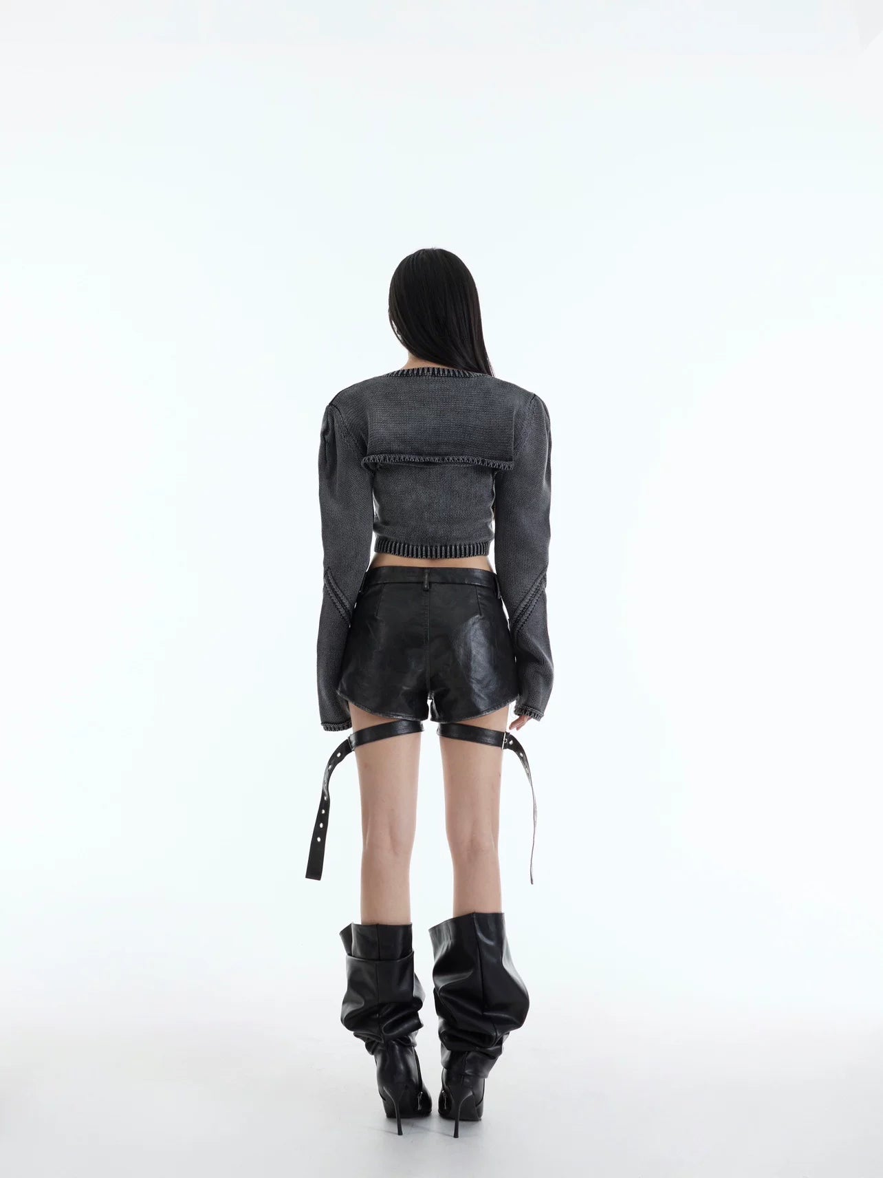 Sanhoostudio two-piece knit set featuring a washed vintage finish. Includes a cropped knit top and relaxed shawl-style outer layer.