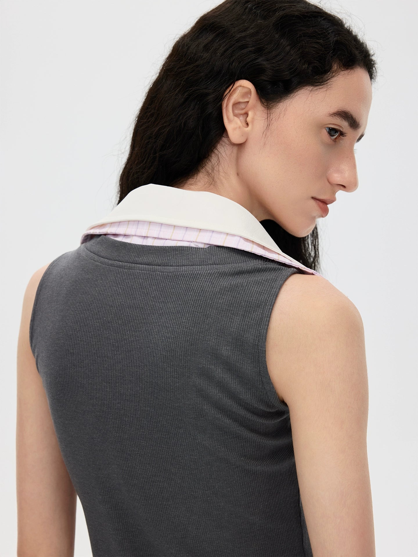 This stylish pink striped knit tank top from Sanhoostudio features a unique double-layer neckline with acetate fabric, offering a slim fit and modern streetwear vibe. Perfect for layering or standalone wear in both casual and chic outfits.