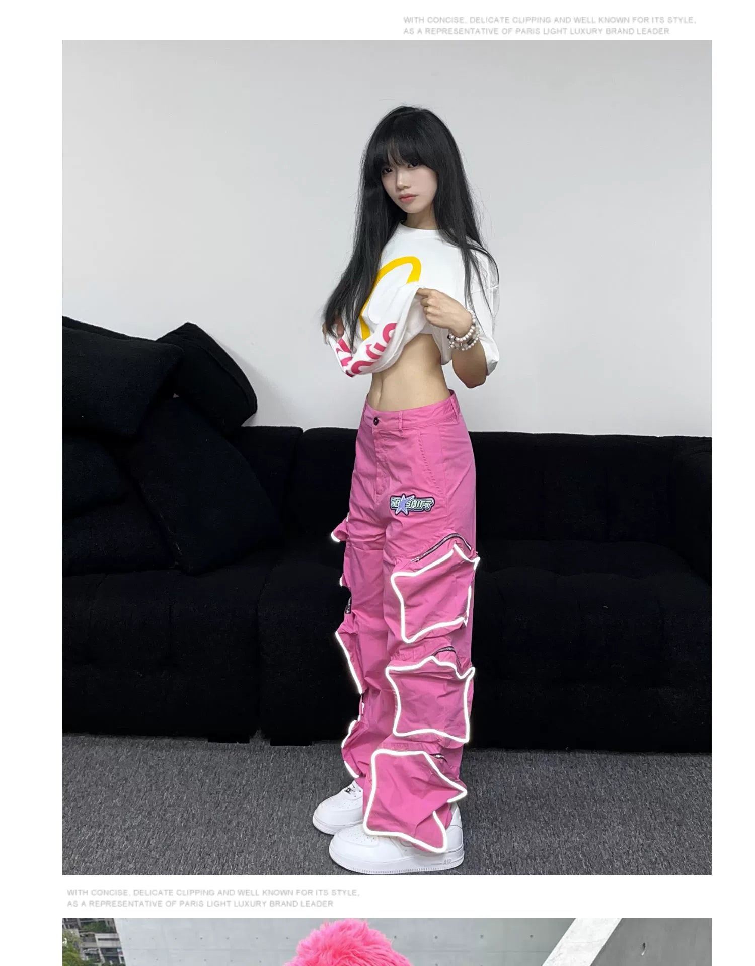 These reflective cargo pants from Sanhoostudio feature 3D star patches and bold avant-garde styling. The oversized fit and dark aesthetic make them ideal for nightwear, performance looks, or urban outfits, blending futuristic energy with functional streetwear practicality.