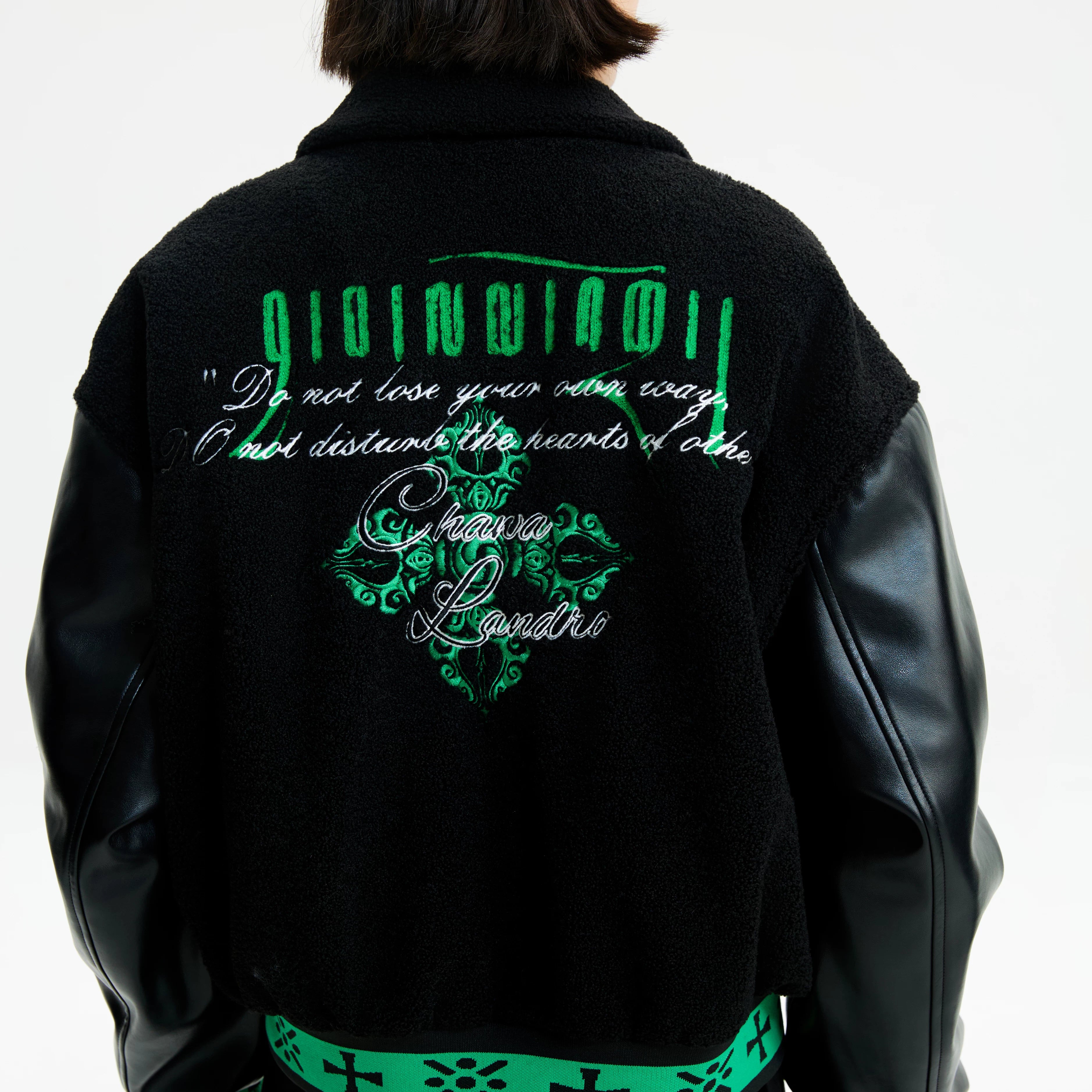 Sanhoostudio zip-up leather jacket with sherpa lining for warmth. Designed for unisex winter streetwear and comfort.