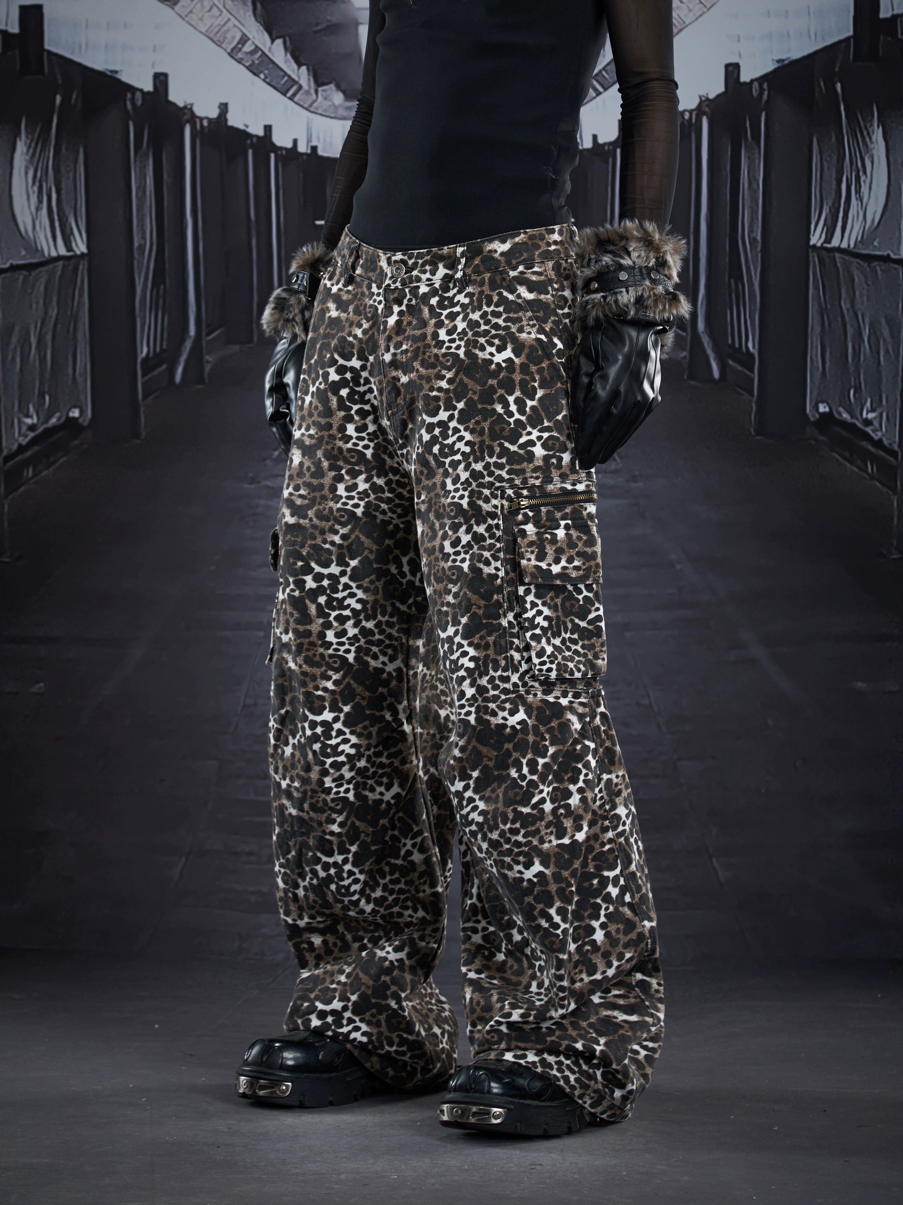 Dark punk-inspired straight cargo pants featuring pleated structure, oversized multi-pocket utility, and a bold leopard pattern. A statement unisex streetwear essential from Sanhoostudio.