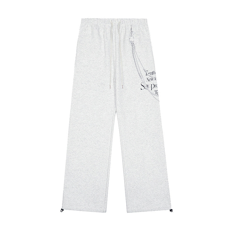 These Sanhoostudio pants stand out with pearl chain embellishments and bold slogan prints, merging casual comfort with high street individuality. Designed with a relaxed fit, they highlight a balance of playful accessories and edgy fashion vibes.