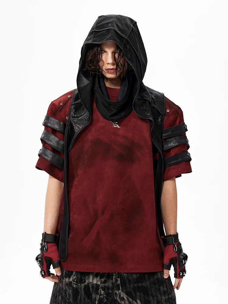 Sanhoostudio dark streetwear T-shirt featuring distressed dye finish, studded details, and leather patchwork accents. Designed with structured shoulder pads and a relaxed fit for bold summer styling.