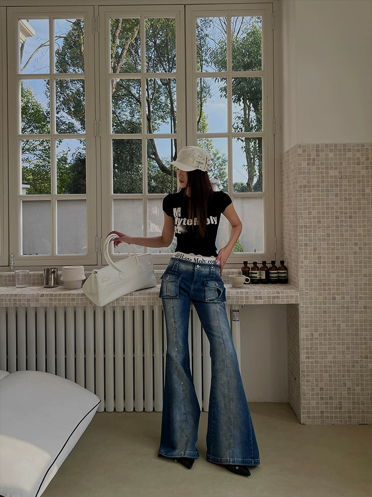 These low-waist stretch denim pants from Sanhoostudio feature a slight flare cut, offering a flattering fit that channels Y2K and retro streetwear vibes. Stylish yet comfortable for daily wear.