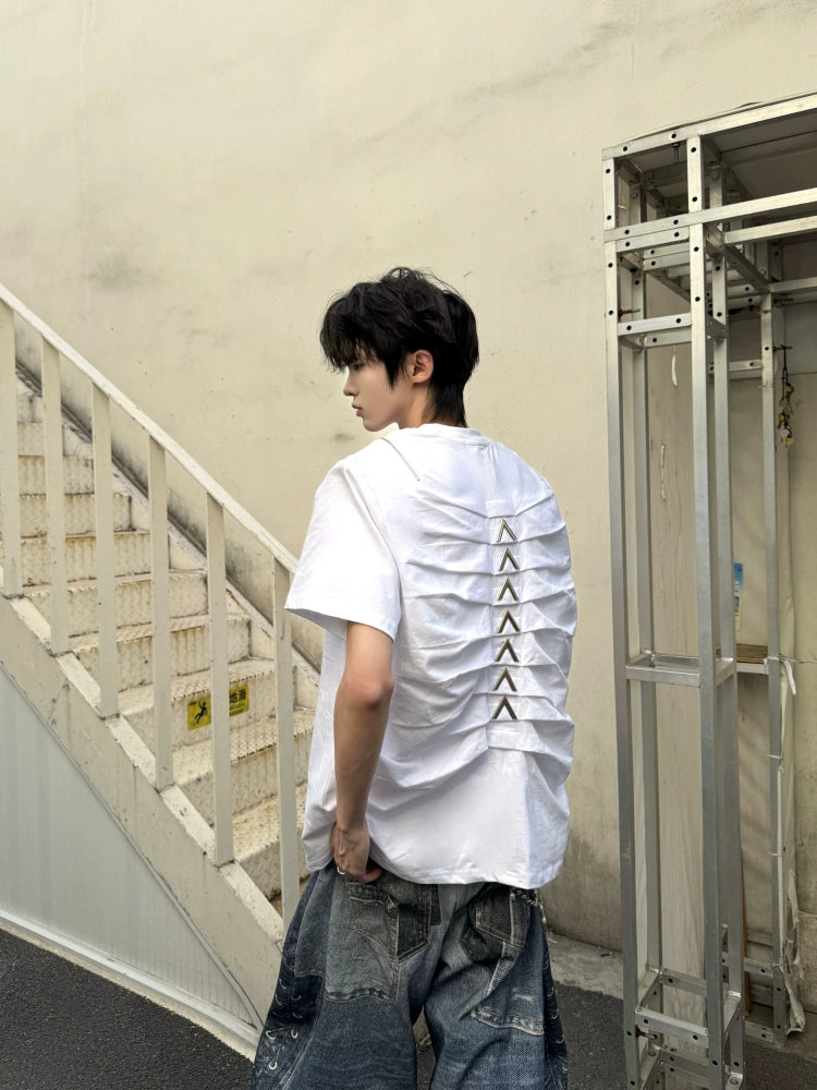Designed by Sanhoostudio, this T-shirt features spine-inspired metallic pleats paired with structured shoulder pads for a futuristic silhouette. Its innovative design and premium construction highlight an avant-garde streetwear vibe, balancing comfort with standout style for bold everyday looks.