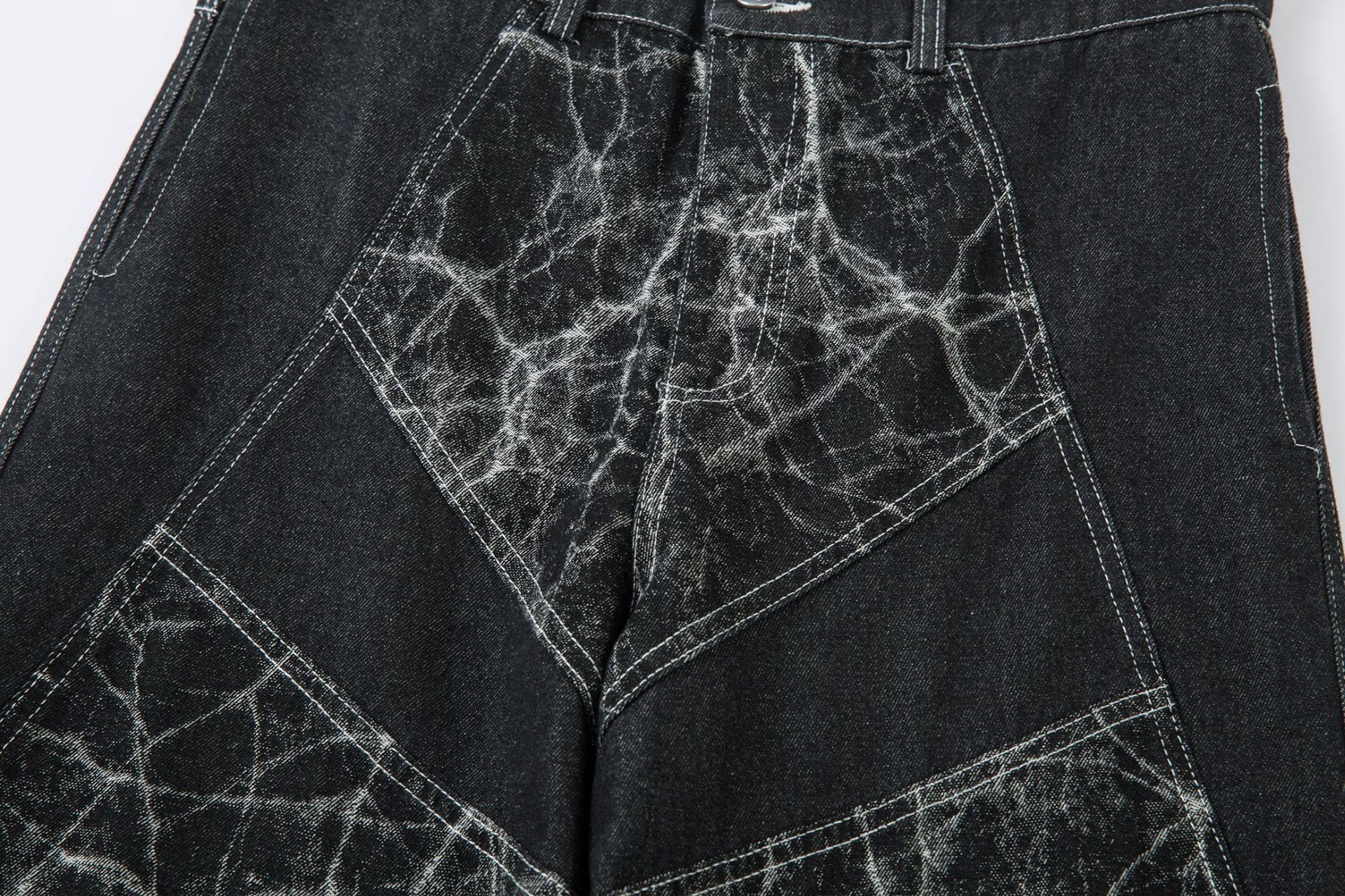 【25s Aug.】Deconstructed Tie-dye Wide-leg Jeans blend bold artistic flair with edgy streetwear design. Featuring a unique tie-dye pattern and raw deconstructed detailing, these jeans make a striking visual statement.