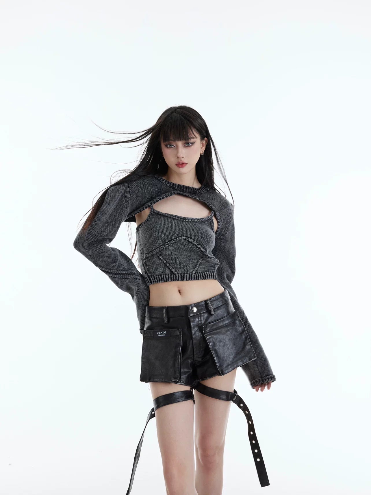 Sanhoostudio two-piece knit set featuring a washed vintage finish. Includes a cropped knit top and relaxed shawl-style outer layer.