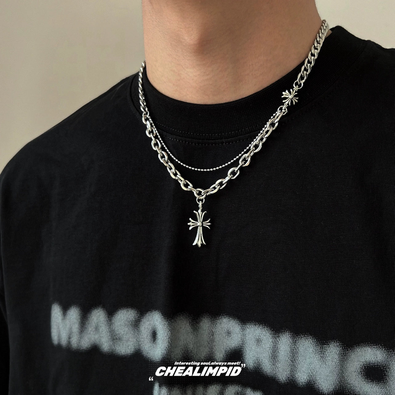 Discover Sanhoostudio’s cross double-layer titanium necklace—sturdy titanium construction paired with layered chains for a versatile unisex accessory suitable for casual and dressy street looks.